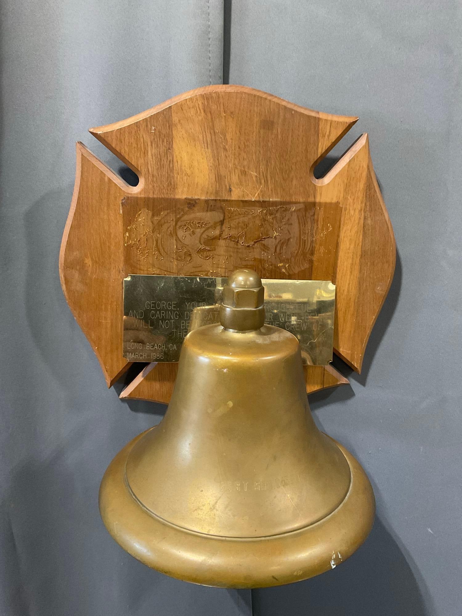 Vintage 1986 Wall Mounted Naval Brass Bell, w/brass plaque, 13h x 13w x 11d inches: Marked SS BT for the SS B.T. San Diego ship. Appears to be in good shape, the plaque has come off, and has some scratches, but this piece is in great shape. some small knicks and signs of age, but it