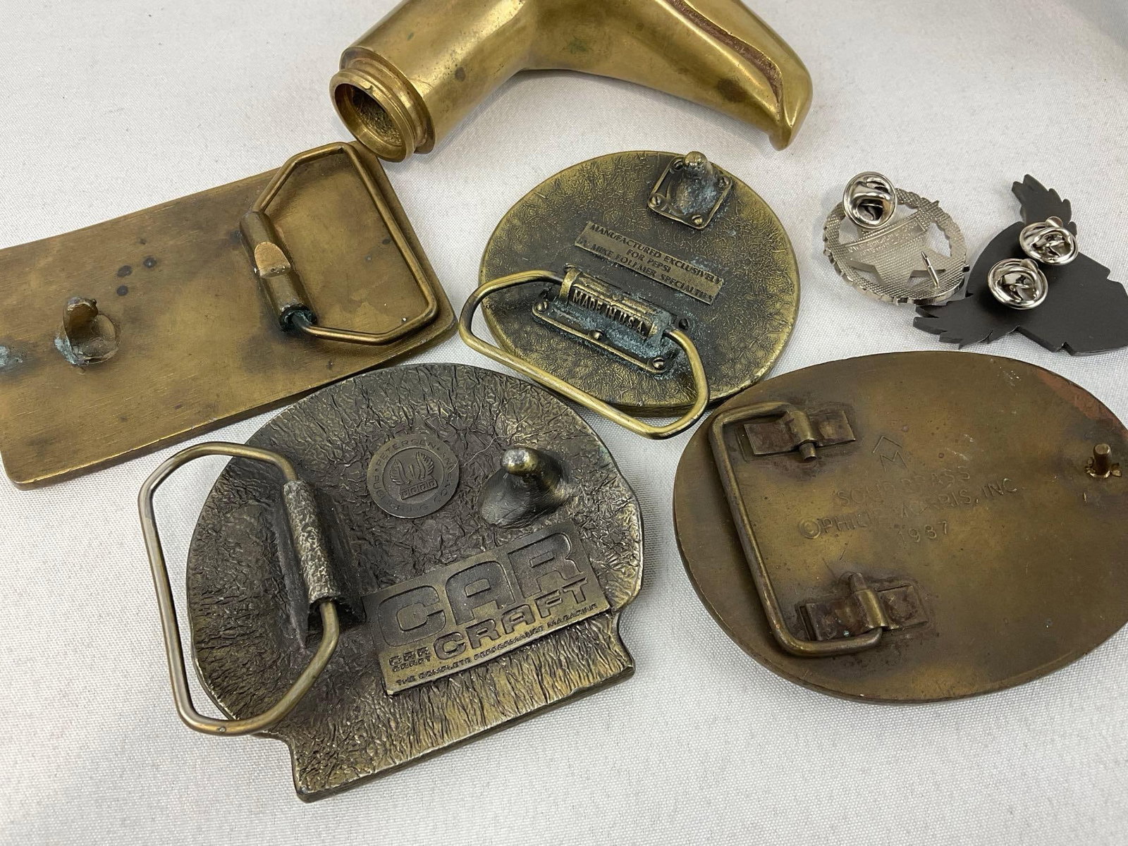 Brass Belt Buckles, Hawk Cane Handle, Harley Davidson chips, 2 Casino Chips, Ace Cigarette Holder & - 10