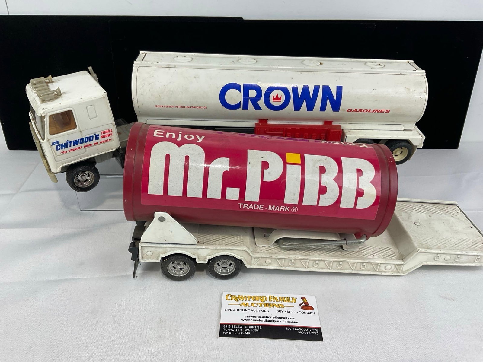 Pair of Tractor Trailers, Mr. Pibb & Crown Gasolines, Joie Chitwoods Thrill Show, approx 1/24 scale: Appears to be in good shape. The piece measures approx 9h x 15w x 10d inches. See pics. E-5940