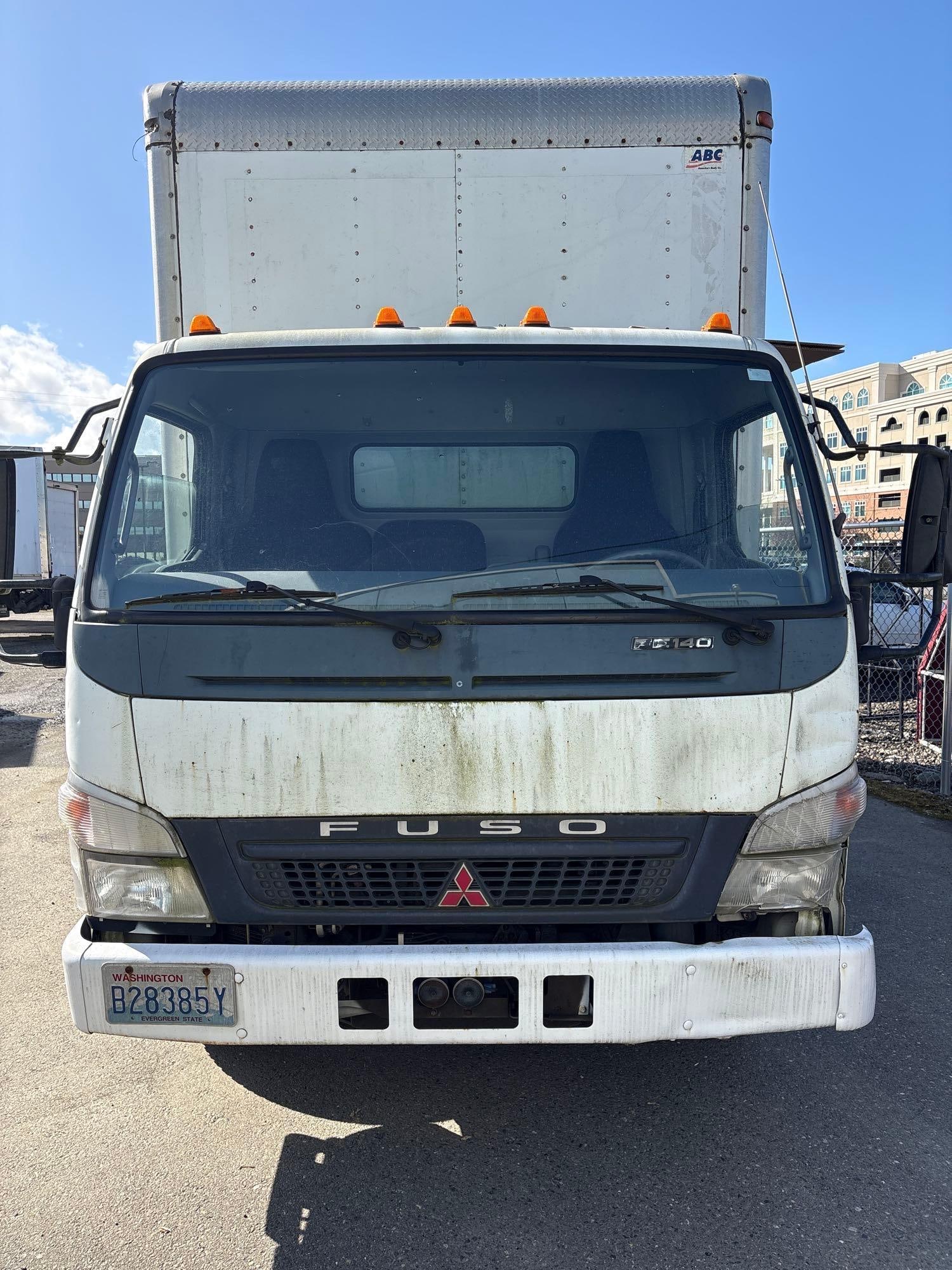 Mitsubishi/Fuso 2007 FE140 with blown head gasket 282,372 miles: C-5680 PLEASE READ: 15 % Only Buyers Premium ,Please call office for onsite preview 360-972-2270 M-F 10 to 4:30 pm Payment is Cash, Bank Wire Transfer , or Certified Bank Draft Sold as is No express