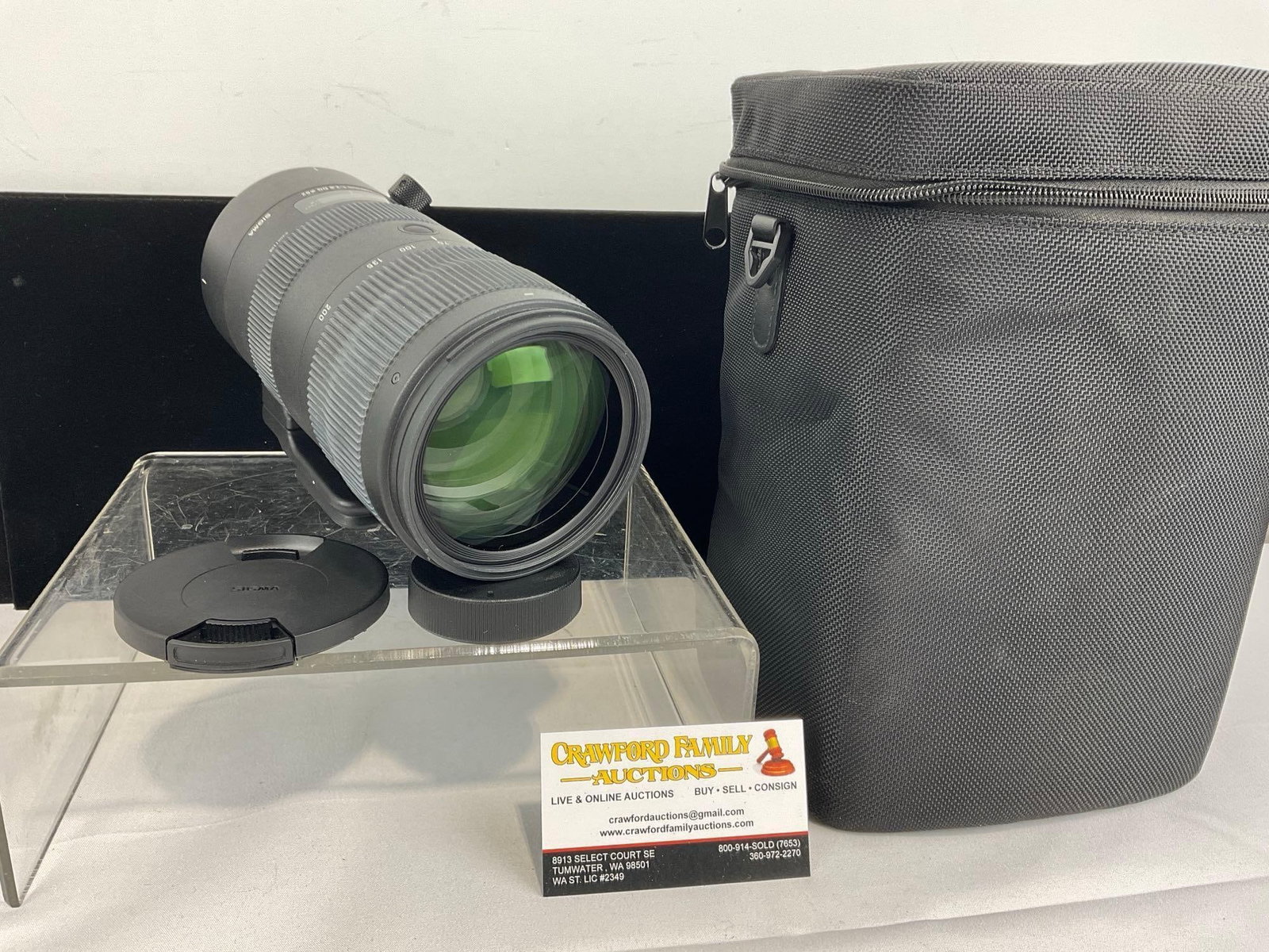 Sigma 70-200mm f/2.8 DG OS HSM Sports Lens w/ Soft Case, Like New: Sells for roughly 1300-1700 dollars. Appears to be in good shape, does not seem to have any wear, looks practically unused. The piece measures approx 11h x 7w x 7d inches. See pics. E-6000