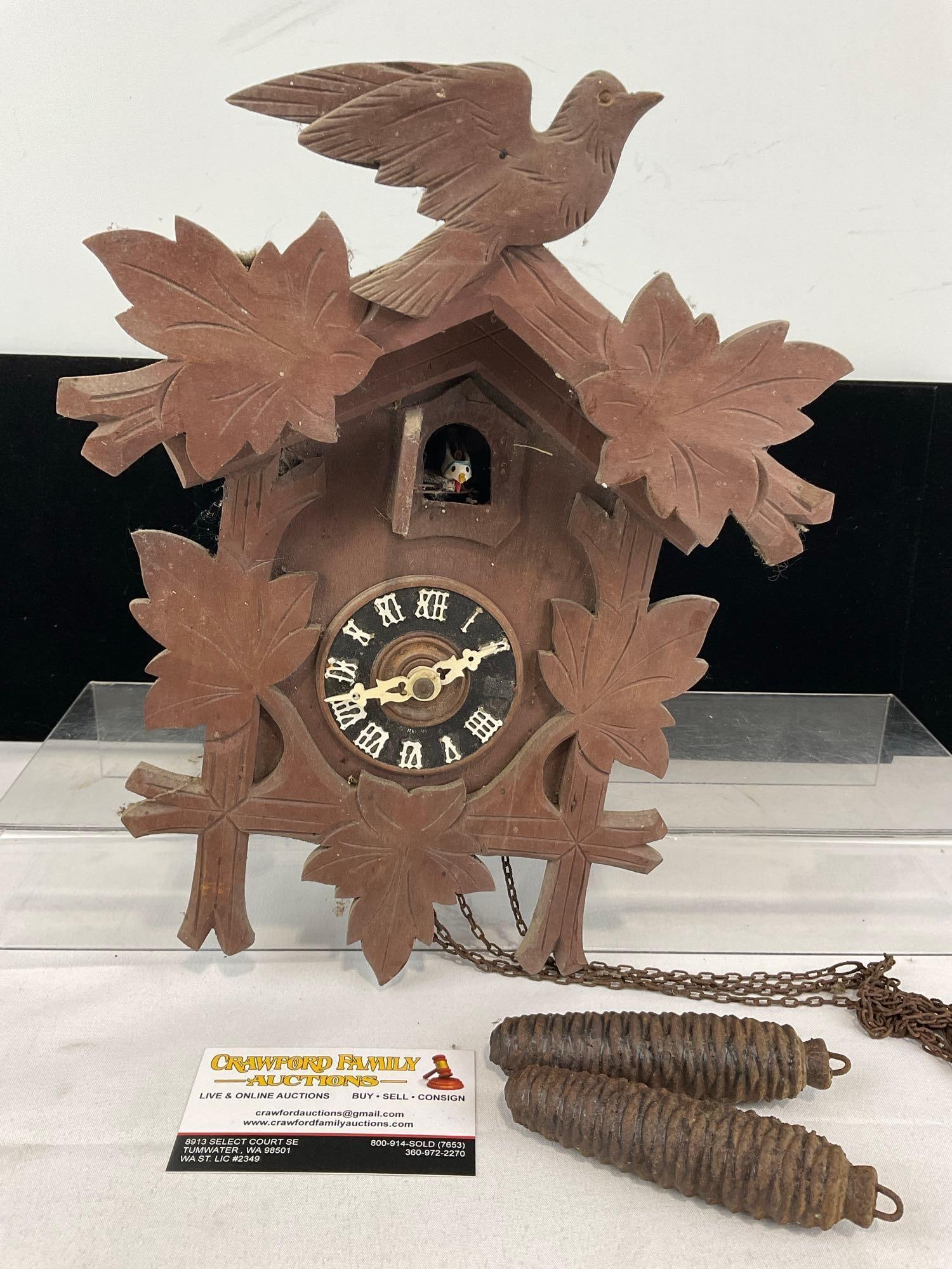 Vintage German Black Forest Cuckoo Clock, w/pinecone weights, 7h x 13w x 10d inches: Appears to be in fair shape, shows some wear from storage. The piece measures approx 7h x 13w x 10d inches. See pics. E-5950