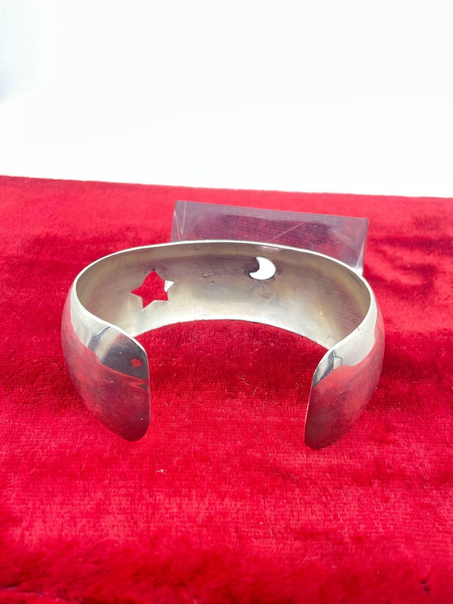 1991 Carol Felley Sterling silver bracelet with story teller / moon and stars motif & stone setting - 4