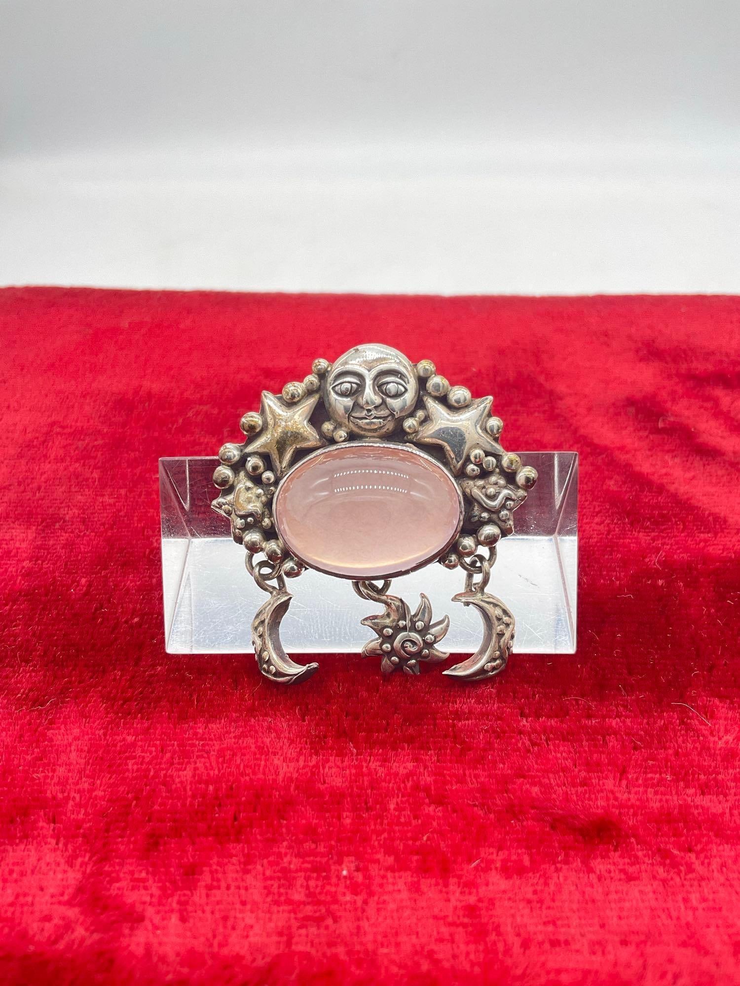 Vintage 1991 Carol Felley sterling silver Native American designed Sun, stars and moon brooch: Approx 21 grams ttw and approx 1 1/2" across