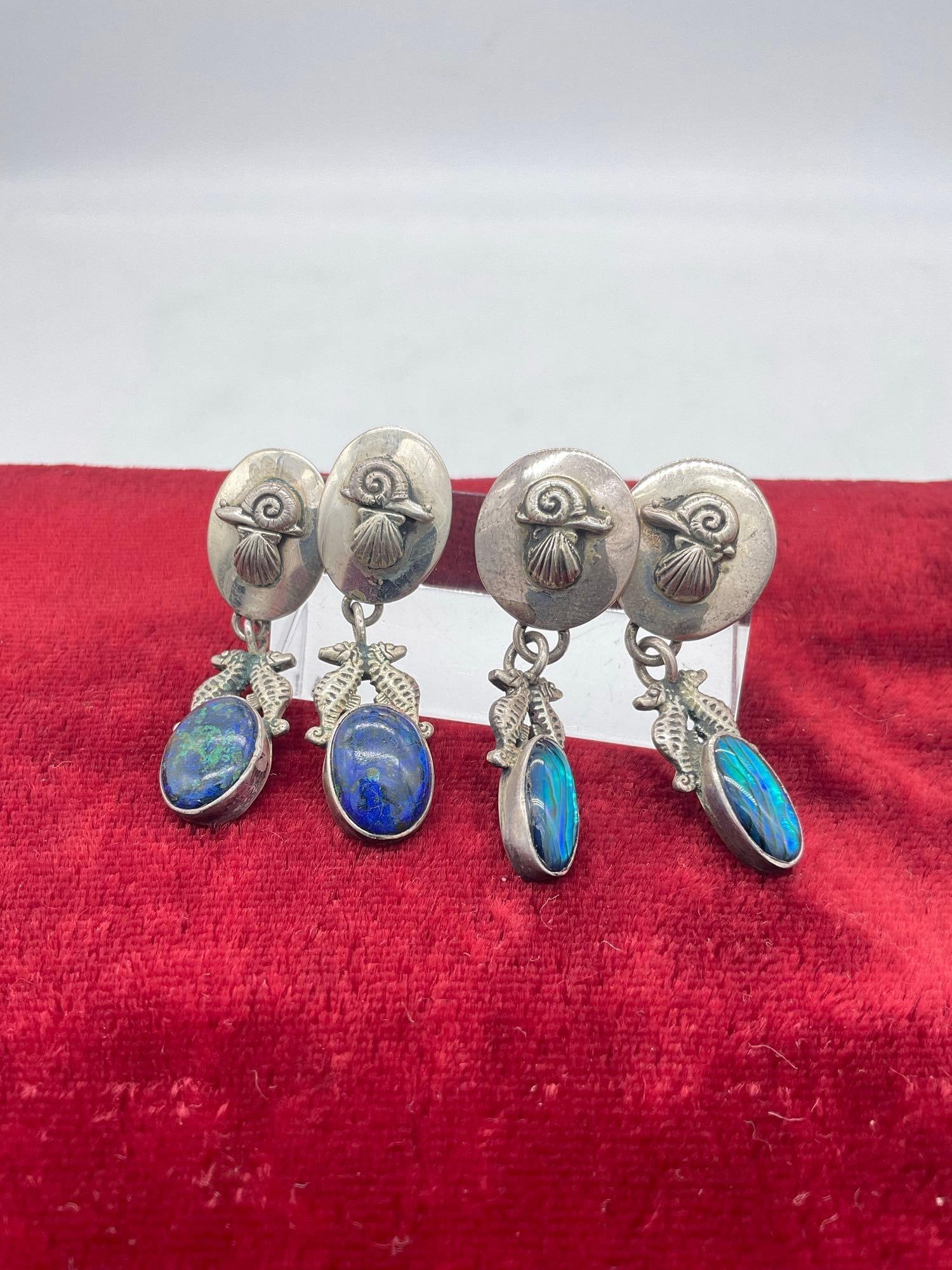 2x pair of vintage sterling silver Carol Felley Native American inspired Seahorse earrings: One pair additionally stamped JC - approx ttw is 20 grams. One has raw green/blue lapis stone settings and the other dyed shell