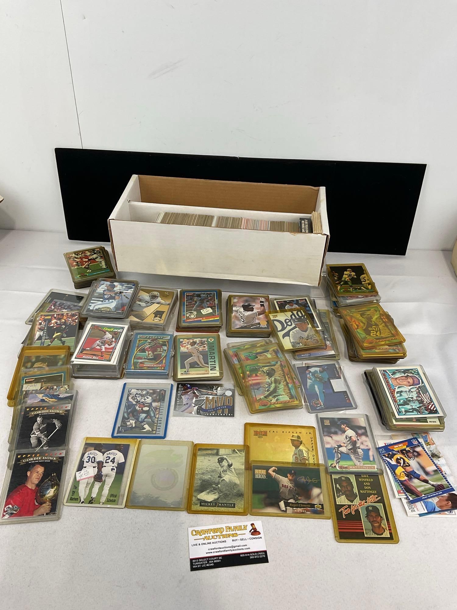 Box of Cards, approx 2000+ cards, All Sports, Upper Deck, Fleer, NFL Pro, good portion are sleeved: Appears to be in good shape. The piece measures approx 5h x 16w x 8d inches. See pics. E-5940