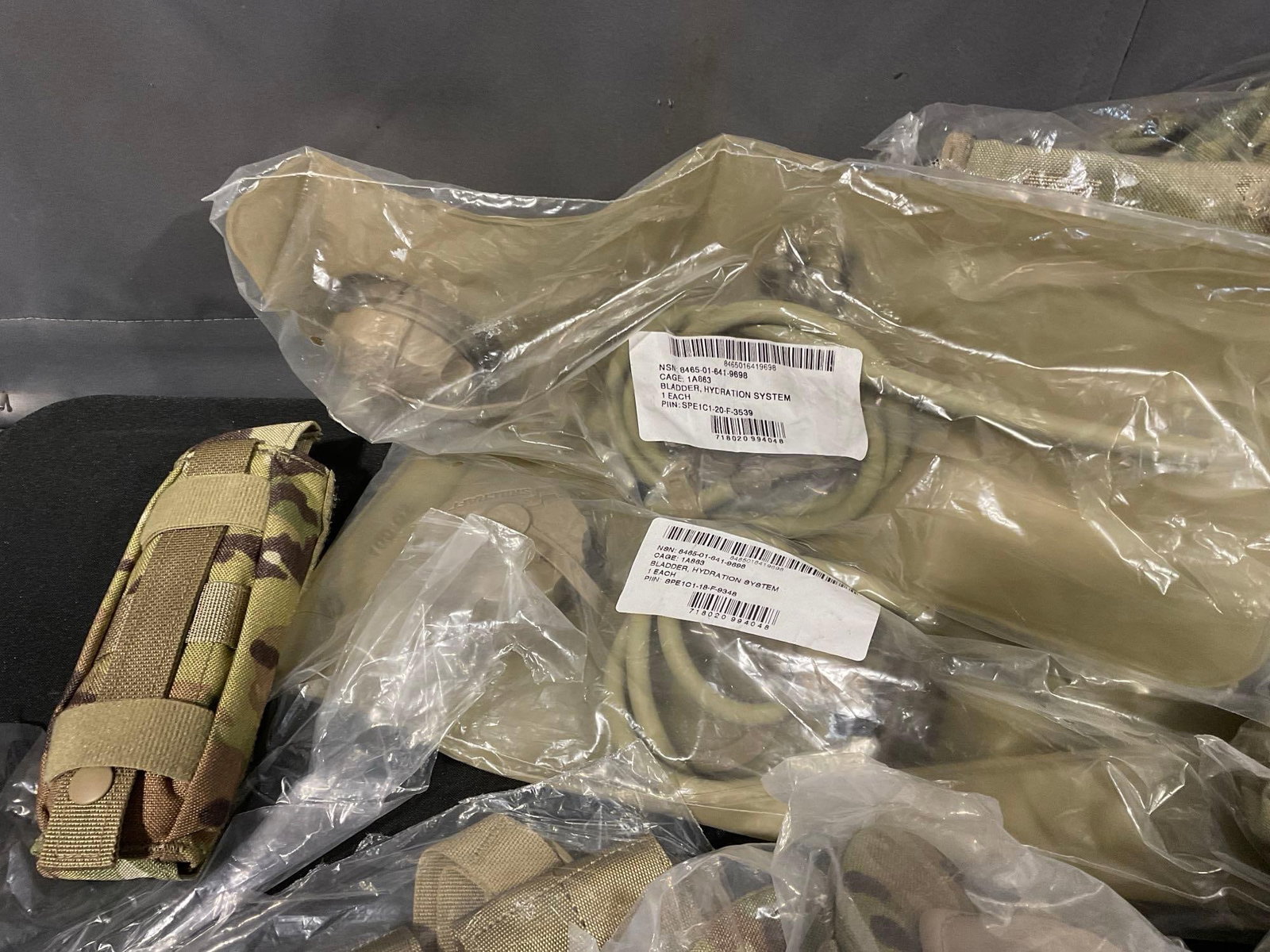 Asst Combat Supplies, Kneepads, Flashlight, 2 Canteens, 2 Magazine Holsters, 2 Hydration Bladders... - 3