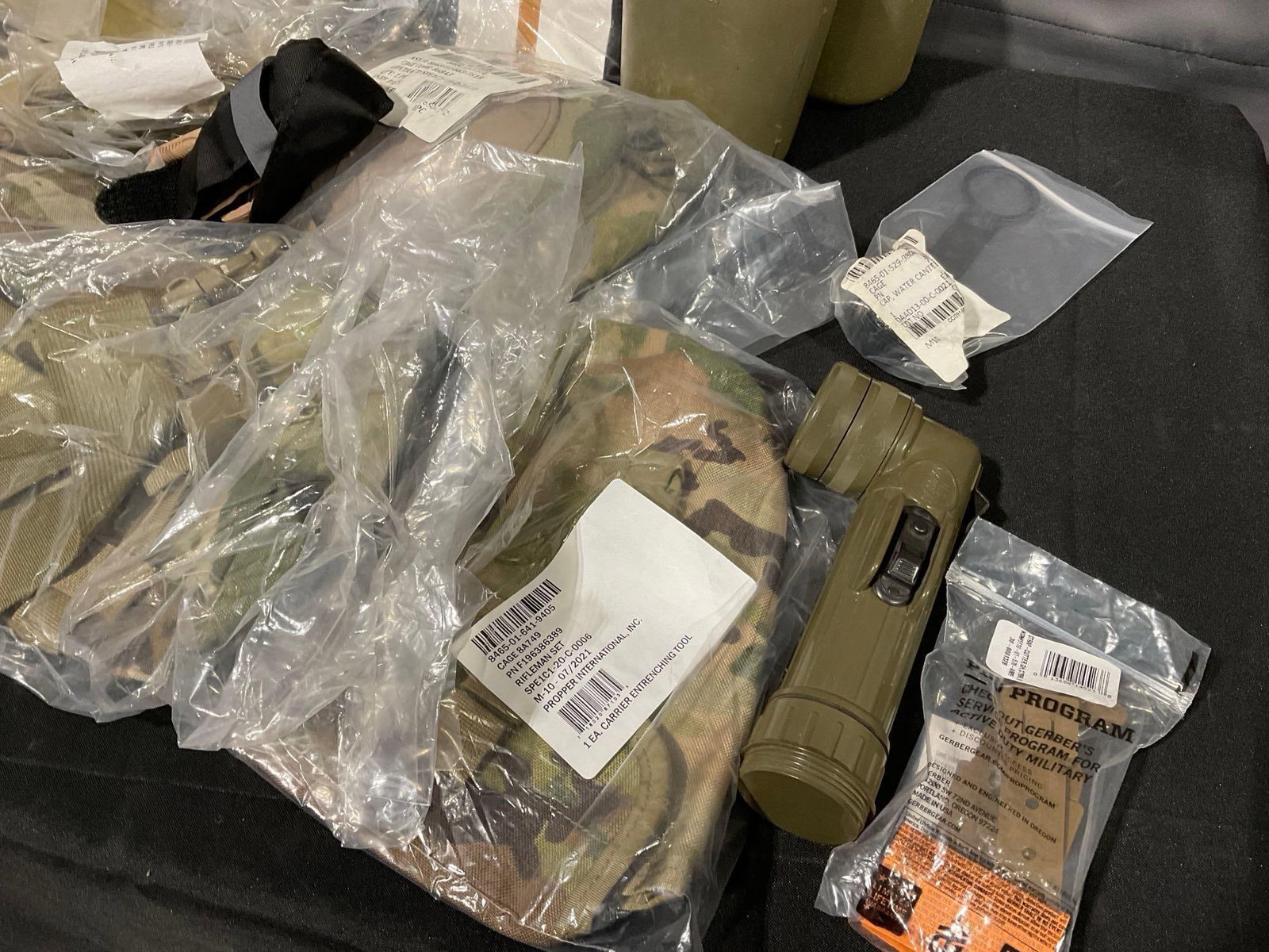 Asst Combat Supplies, Kneepads, Flashlight, 2 Canteens, 2 Magazine Holsters, 2 Hydration Bladders... - 5