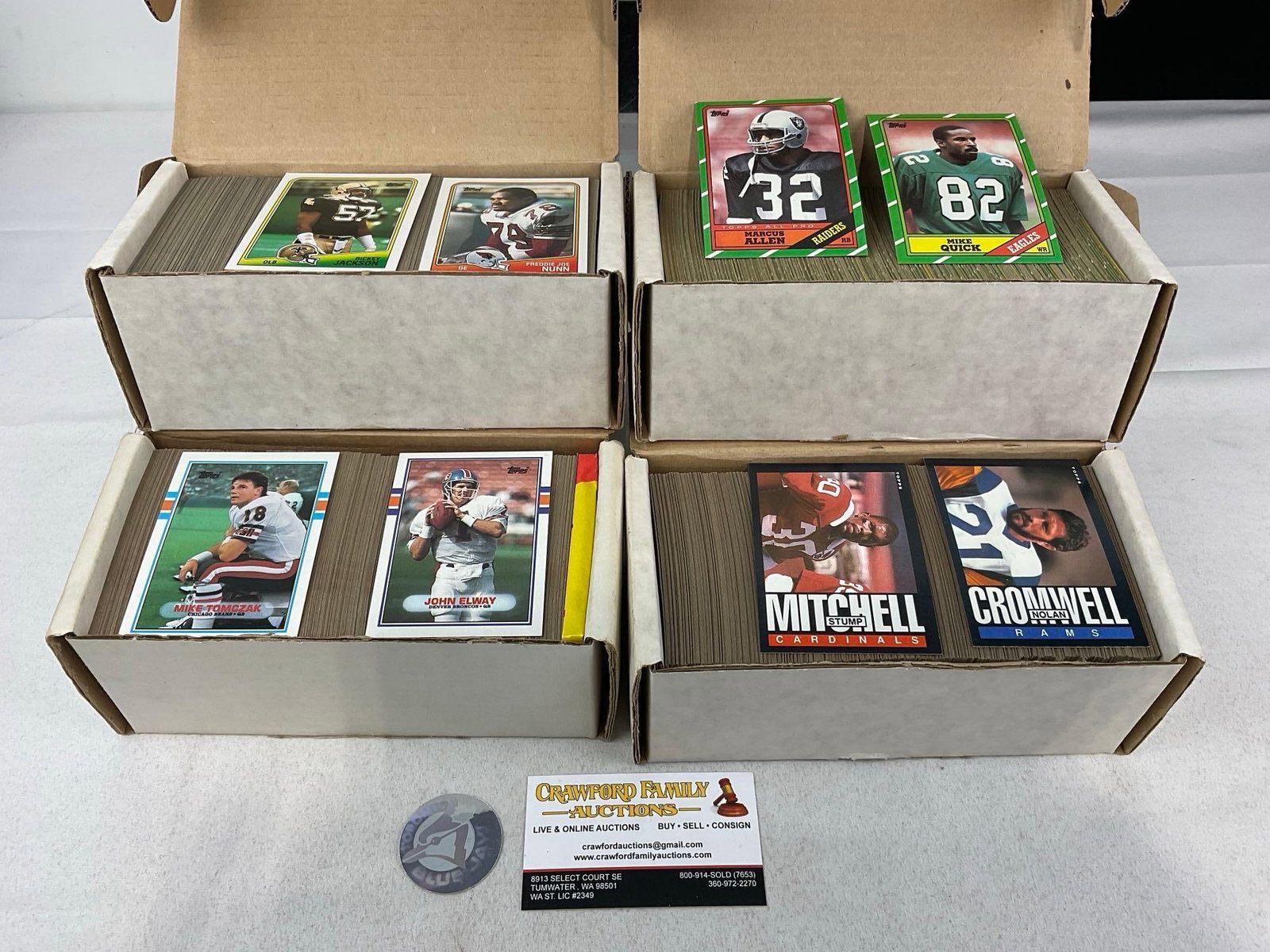 4 Smaller Boxes of Football Cards, approx 2000+ cards, Topps from 80s-90s: Appears to be in good shape. The piece measures approx 8h x 9w x 8d inches. See pics. E-5950