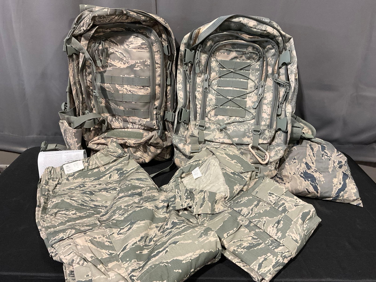 Pair of Code Alpha Backpacks, & Lion ABU Trousers 40R size & 36S coat: Appears to be in good shape. The piece measures approx 16h x 25w x 17d inches. See pics. E-5600