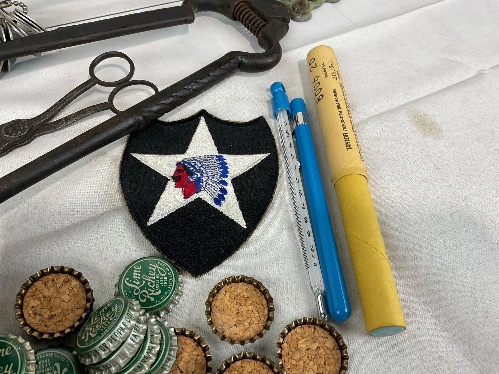 Tongs, Coin Bank, Paper Nativity, Compass, Vintage Bottle Caps, 1940s Work Light, Alarm Bell & more - 3