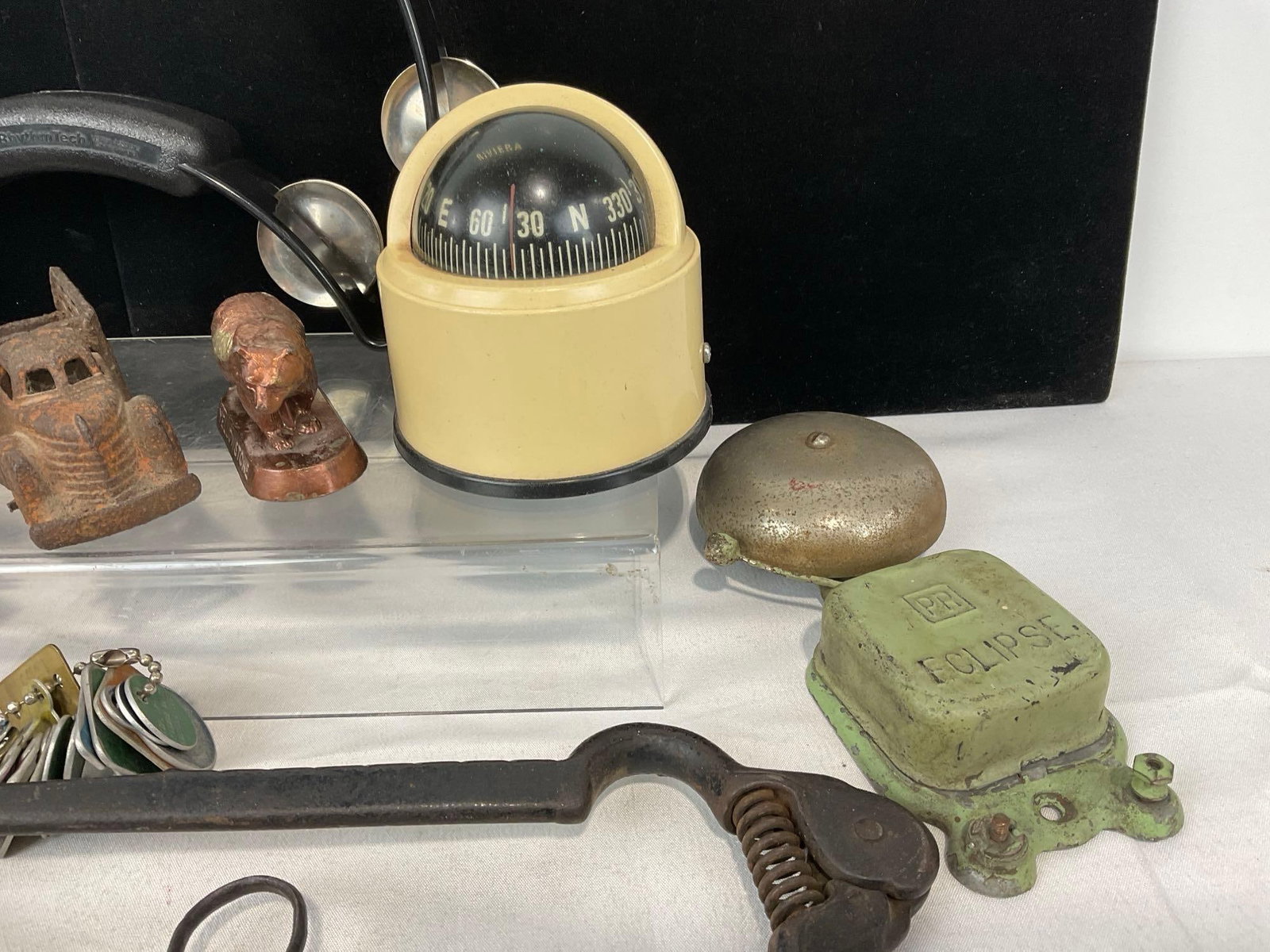 Tongs, Coin Bank, Paper Nativity, Compass, Vintage Bottle Caps, 1940s Work Light, Alarm Bell & more - 5