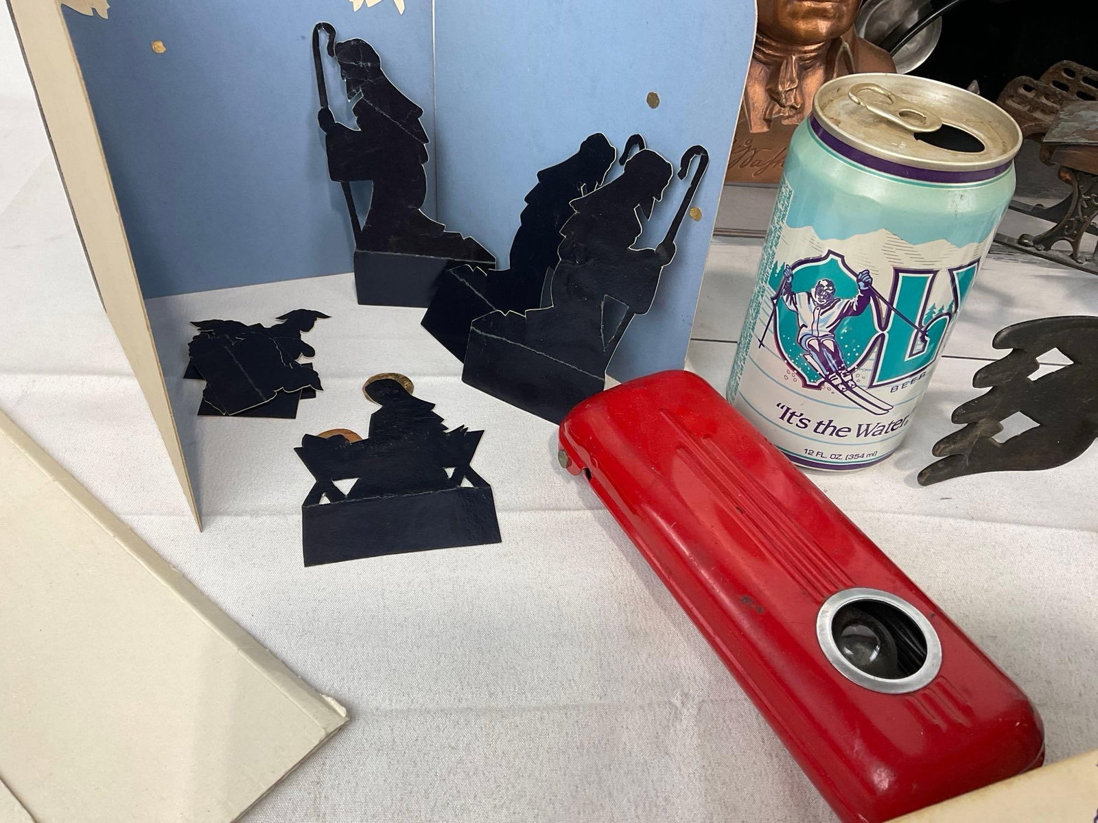 Tongs, Coin Bank, Paper Nativity, Compass, Vintage Bottle Caps, 1940s Work Light, Alarm Bell & more - 7