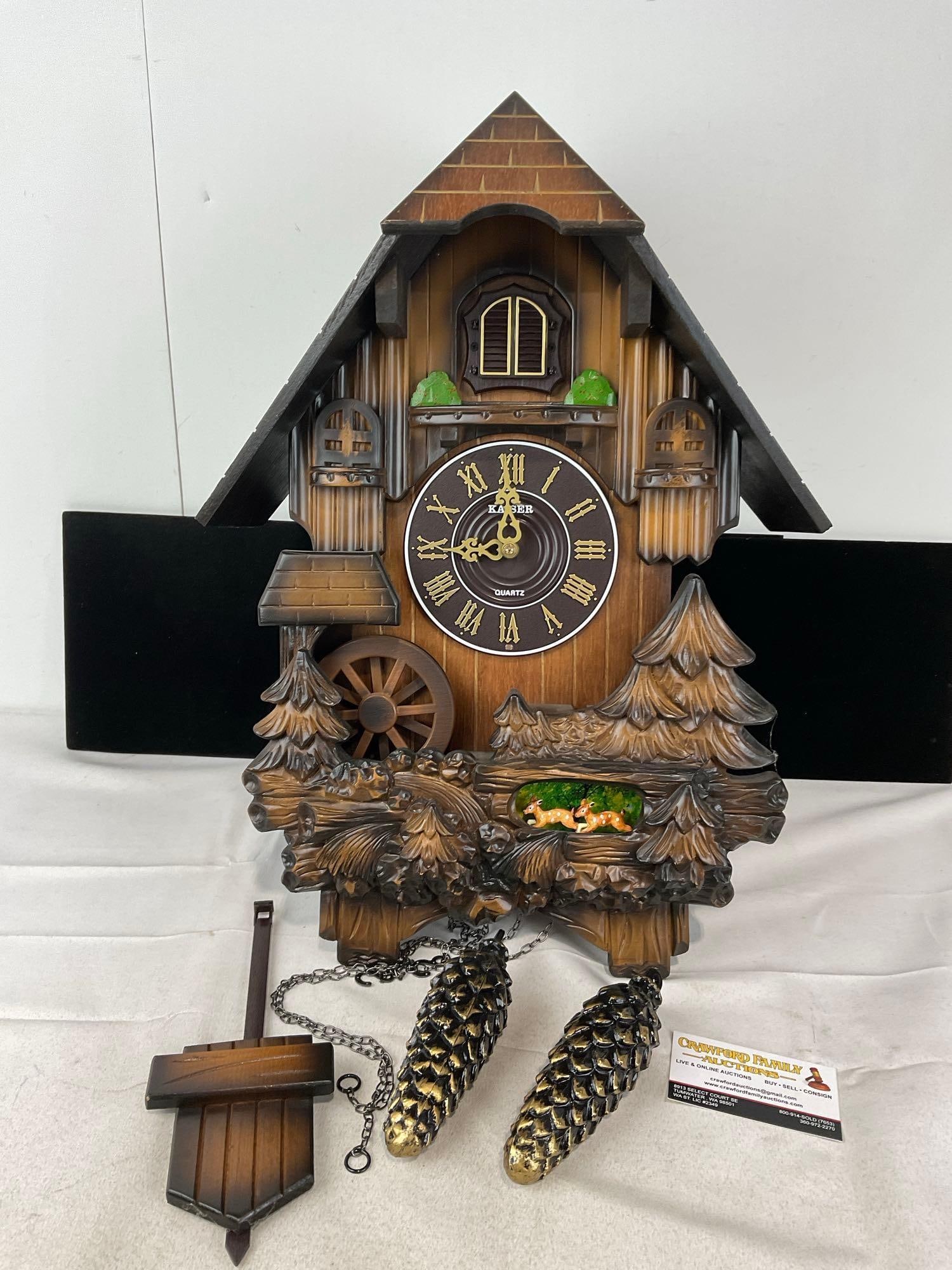 Black Forest Cuckoo Clock replica, Plywood & Plastic Made in Korea: Faux weights, and battery powered. Untested. Appears to be in good shape. The piece measures approx 21h x 16w x 9d inches. See pics. E-5830