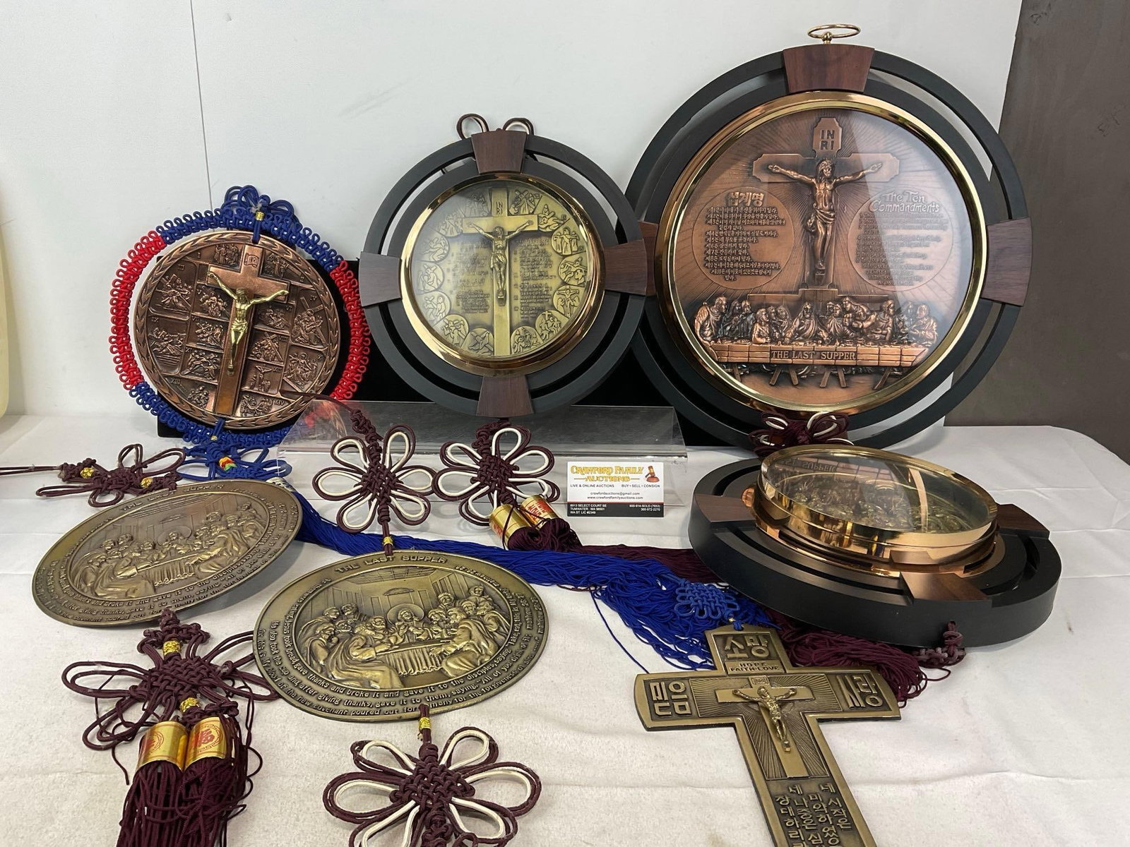 7 Korean Christian Wall Hangings, Cast Metal icons, 3 w/plastic frames, w/braided Tassels: Appears to be in good shape. The piece measures approx 17h x 16w x 13d inches. See pics. E-5830