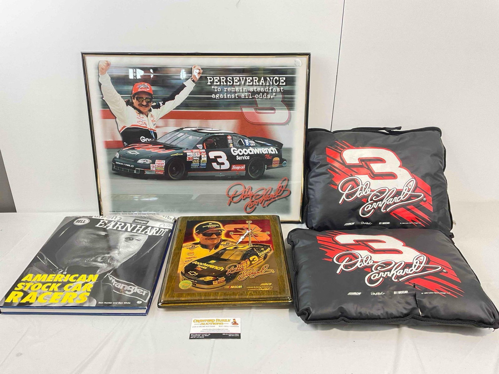 5 pcs Vintage Dale Earnhardt Memorabilia, incl. Framed Poster, Book, Clock & Pillows. See pics.: 5 pcs Vintage Dale Earnhardt Memorabilia, incl. Framed Poster, Book, Clock & Pillows. Corner of frame is torn, one pillow is torn, minor wear indicative of age and use, condition is otherwise