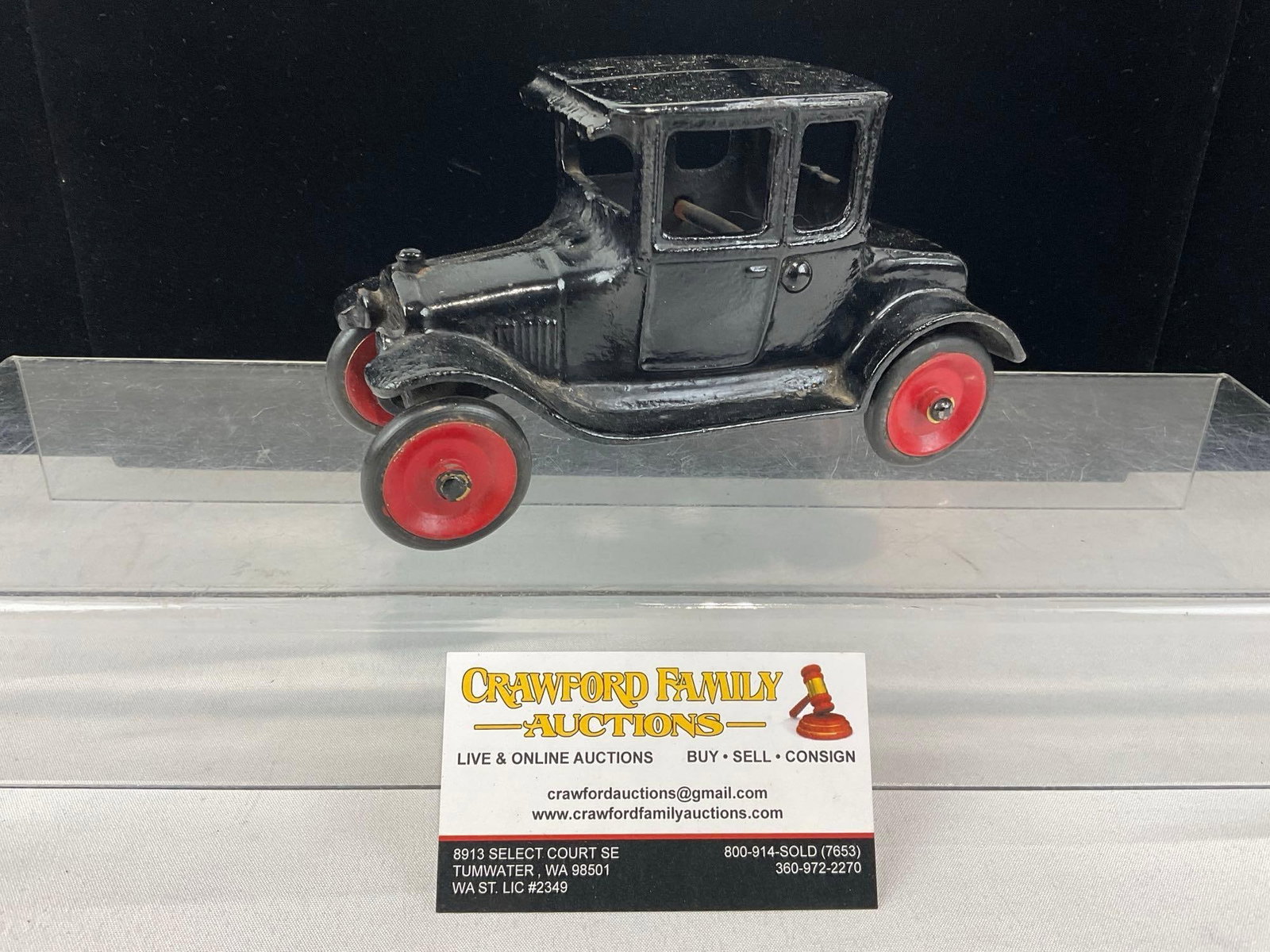 Early 20th Century Arcade Mfg Co. Cast Iron Toy Car, Ford Model T Coupe, Painted Black w/Red Wheels: Appears to be in good shape. The piece measures approx 5h x 7w x 4d inches. See pics. E-5950