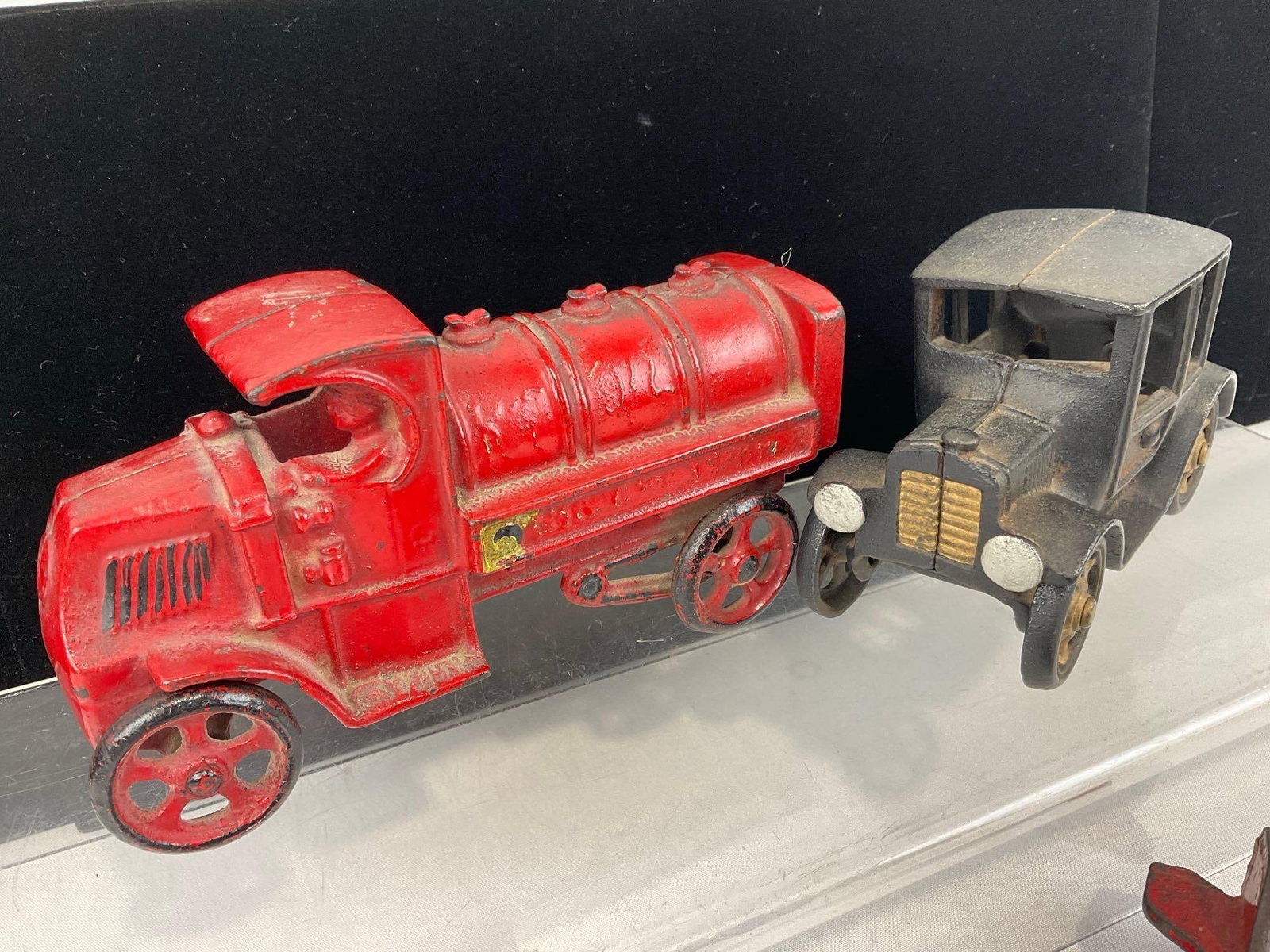 Cast Iron Toys, Red Hubley Fire Truck, Black Model T Coupe, & Red Plane - 2