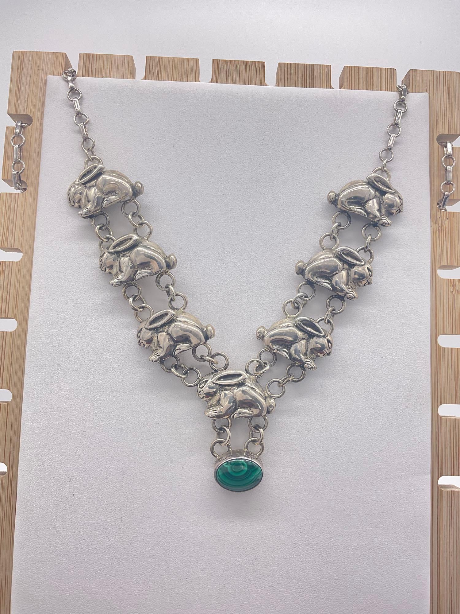 Vintage Carol Felley Native American influence Rabbit statement bib necklace w/ malachite: Weighs approx 72 grams and is approx 22" in length