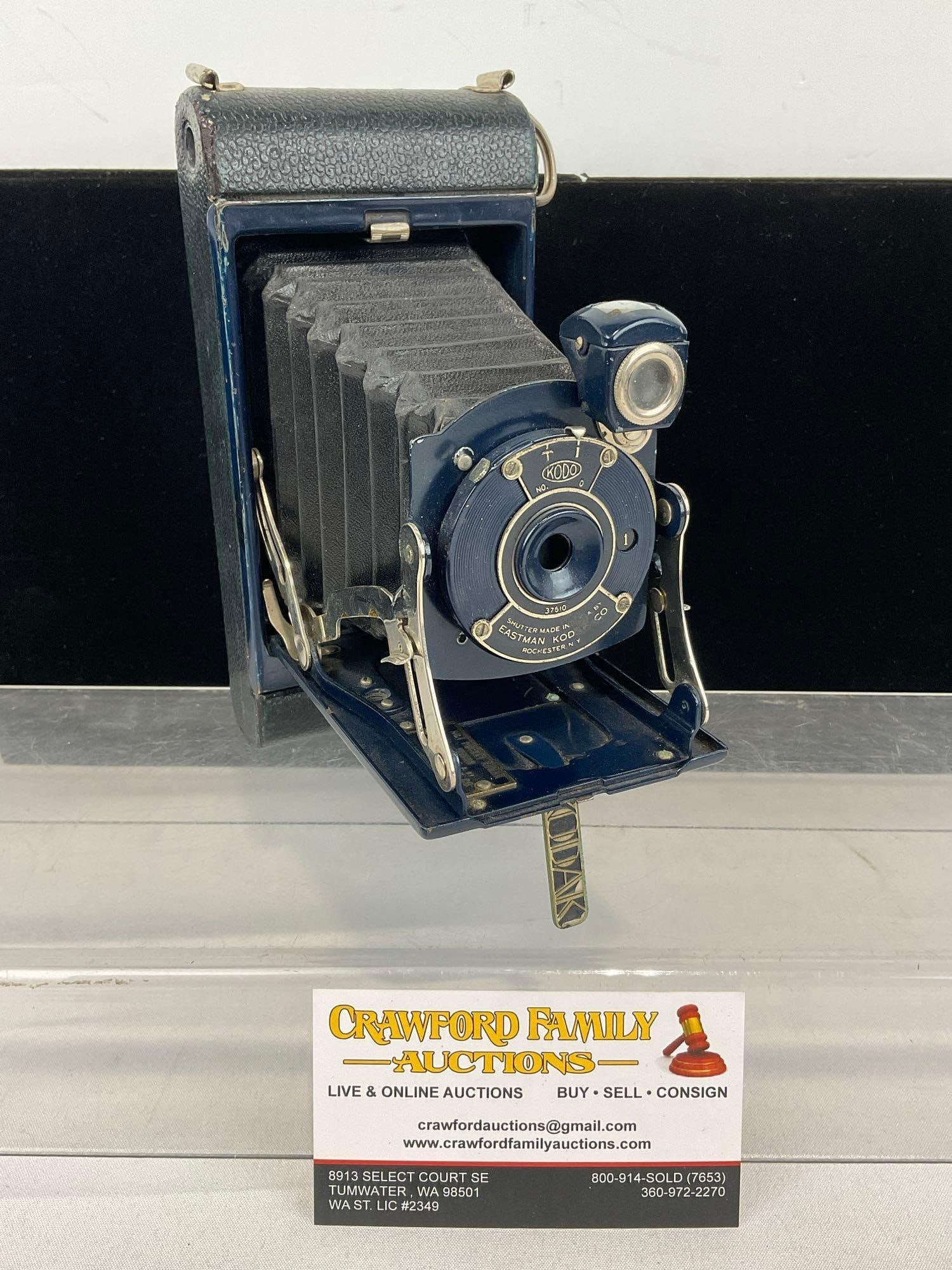 1930s Eastman Kodak Co. No.1 Pocket Kodak Junior, in Dark Cobalt blue finish, uses 127 film: We are not camera experts, all noted condition is cosmetic, and all cameras are untested/ as is. These cameras are from a large single consignor collection that has been well kept in storage, but the