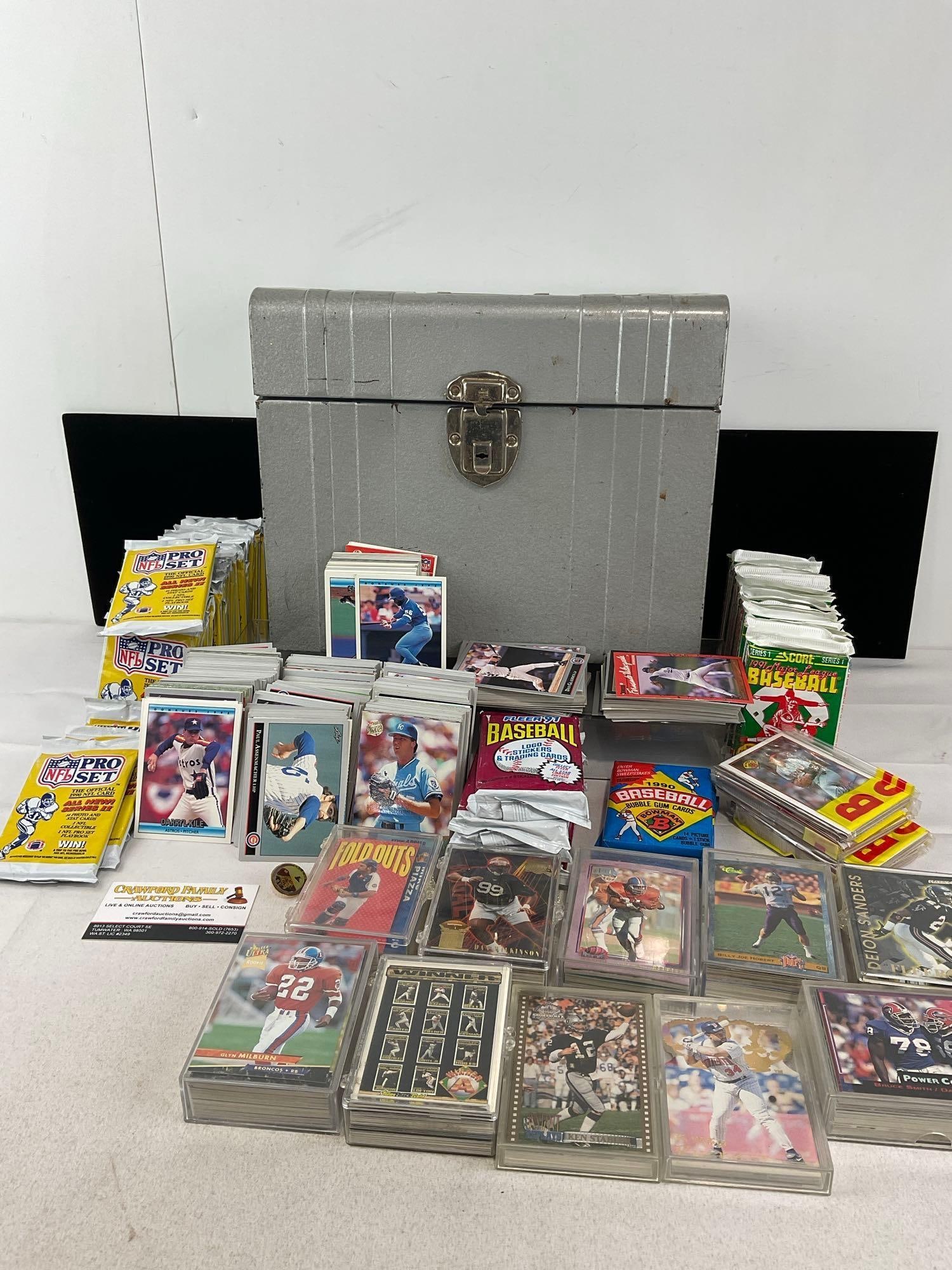Assorted Baseball & Football Cards, approx 1k loose cards, 60+ 1990s Score, Fleer, & Bowman Packs: Appears to be in good shape. The piece measures approx 11h x 13w x 7d inches. See pics. E-5940