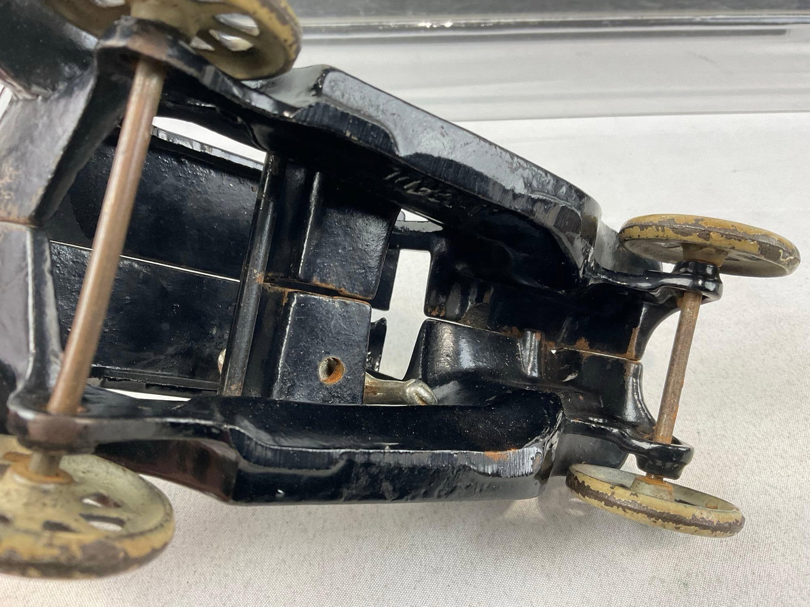 3Cast Iron Toys, Arcade Ford Model T, Bus w/breaks, & Smaller Hubley? Model T, & Tin Trolley Figure - 4