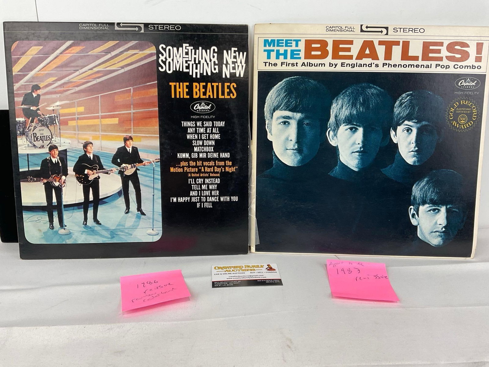 Pair of Beatles Vinyl Records, Something New & Meet The Beatles, appears to be vintage reissues: The pair appear to be reissues, 1986 & 1983, we are not experts on records. Appears to be in good shape. The piece measures approx 2h x 14w x 14d inches. See pics. E-5950