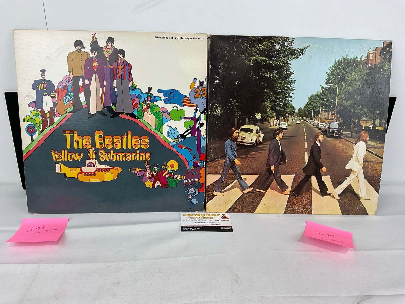 Pair of Beatles Vinyl Records, Yellow Submarine & Abbey Road, appears to be vintage reissues: The pair appear to be reissues, both 1978, we are not experts on records. Appears to be in good shape. The piece measures approx 2h x 14w x 14d inches. See pics. E-5950