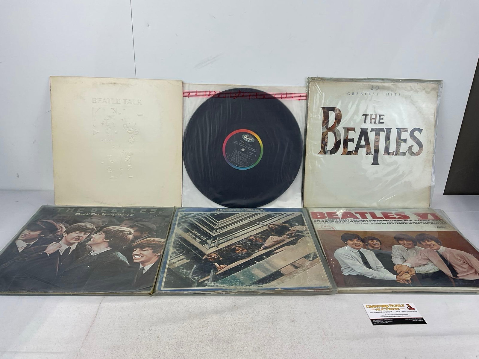 6 Vinyl Records, Beatles VI, 1967-70, Rubber Soul, Vol 1&2 Rock n Roll, Greatest Hits, & Beatle T...: We are not experts on records. Appears to be in good shape. The piece measures approx 2h x 14w x 14d inches. See pics. E-5950