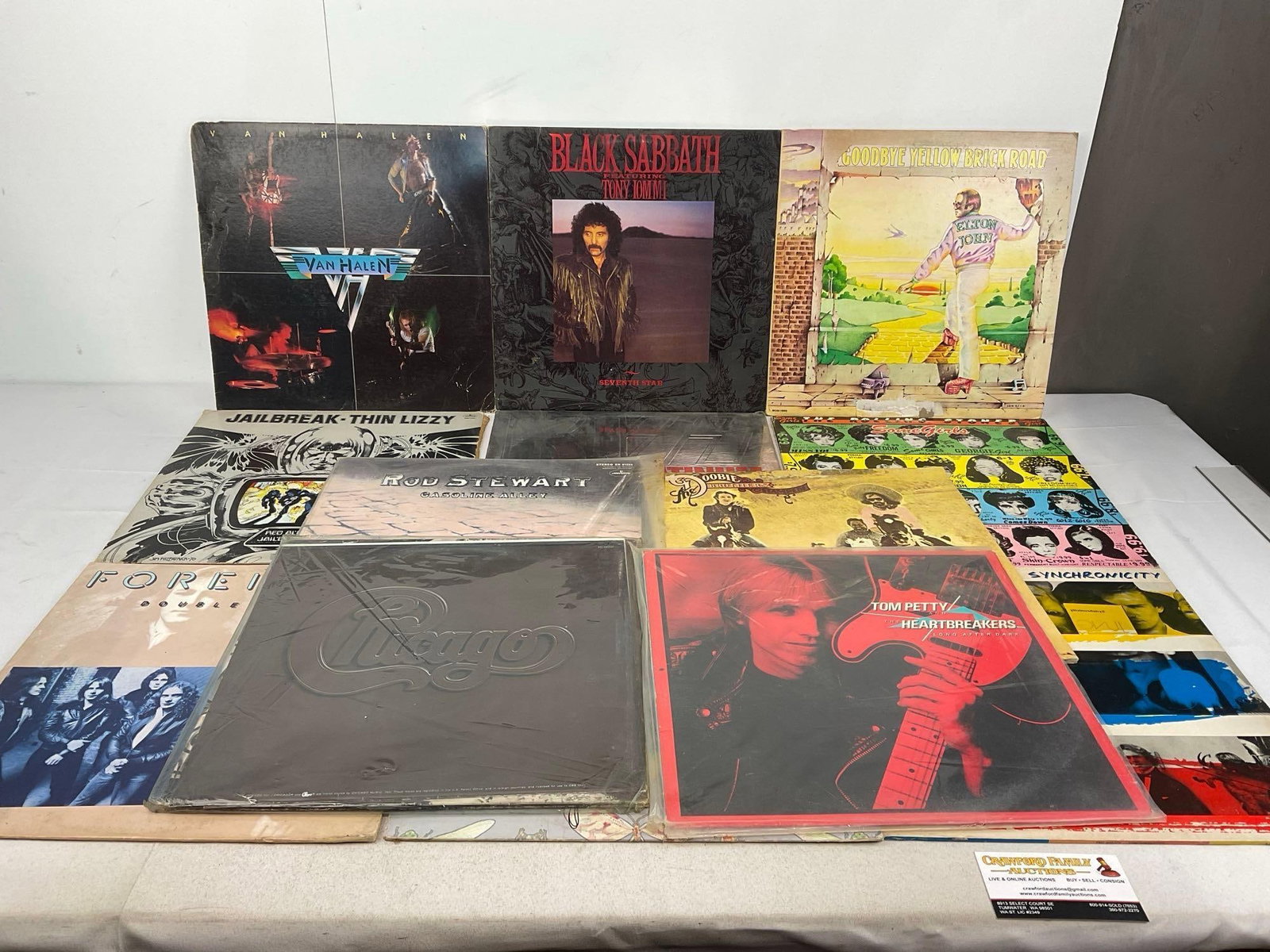 13 Vinyl Records, Van Halen, Elton John, Chicago, Foreignor, Doobie Brothers, Tom Petty & more: Appears to be in good shape. The piece measures approx 5h x 14w x 14d inches. See pics. E-5950