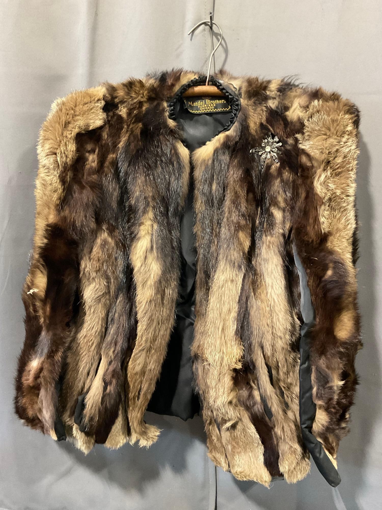 Vintage Fur Coat, Mandel Brothers Furriers, Chicago, looks to be Mink: Appears to be in fair to good shape. The piece measures approx 31h x 25w x 3d inches. See pics. E-5950