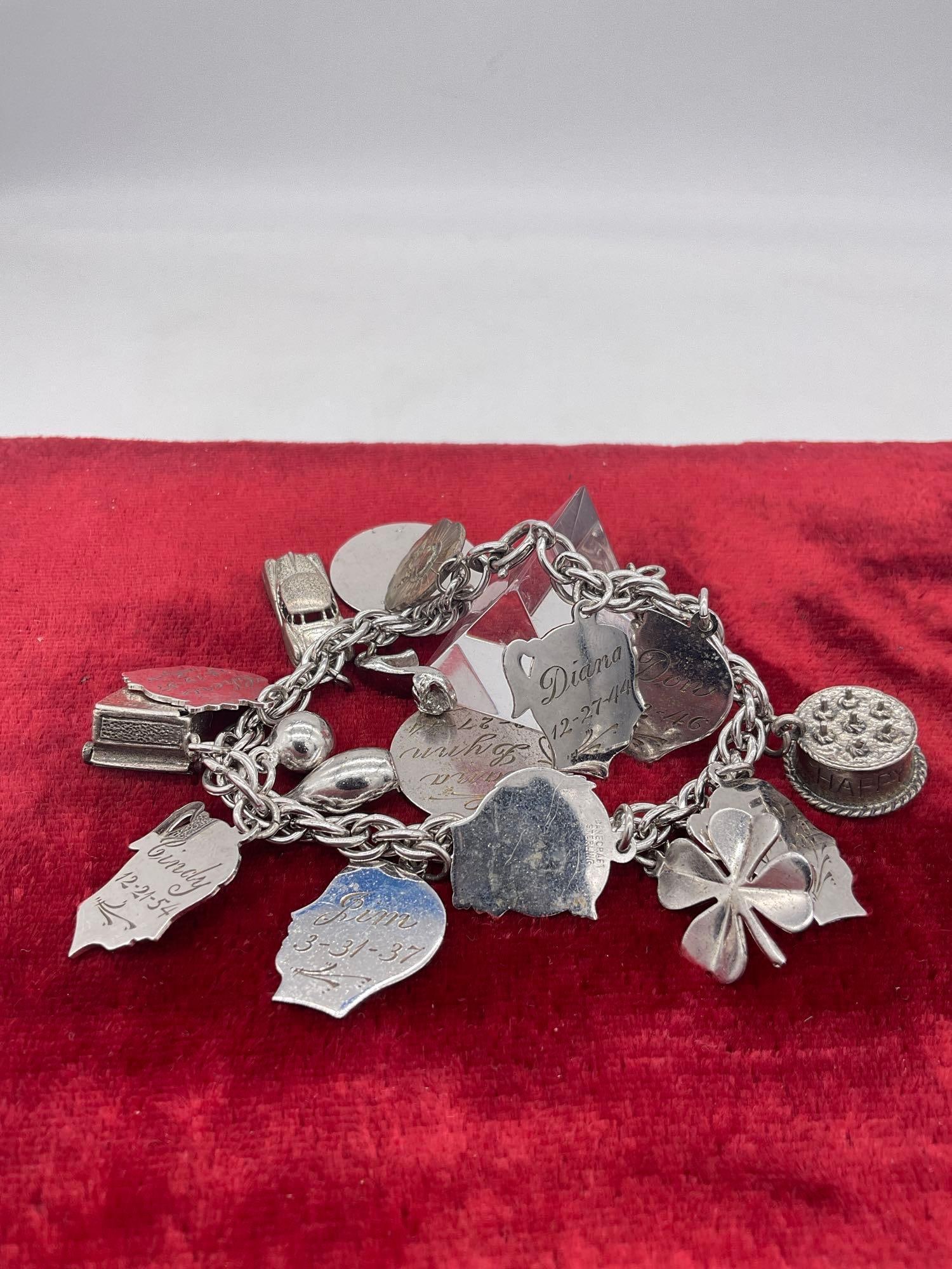 Stainless bracelet loaded with sterling silver charms, many Danecraft - approx 63 grams ttw: JC-5680