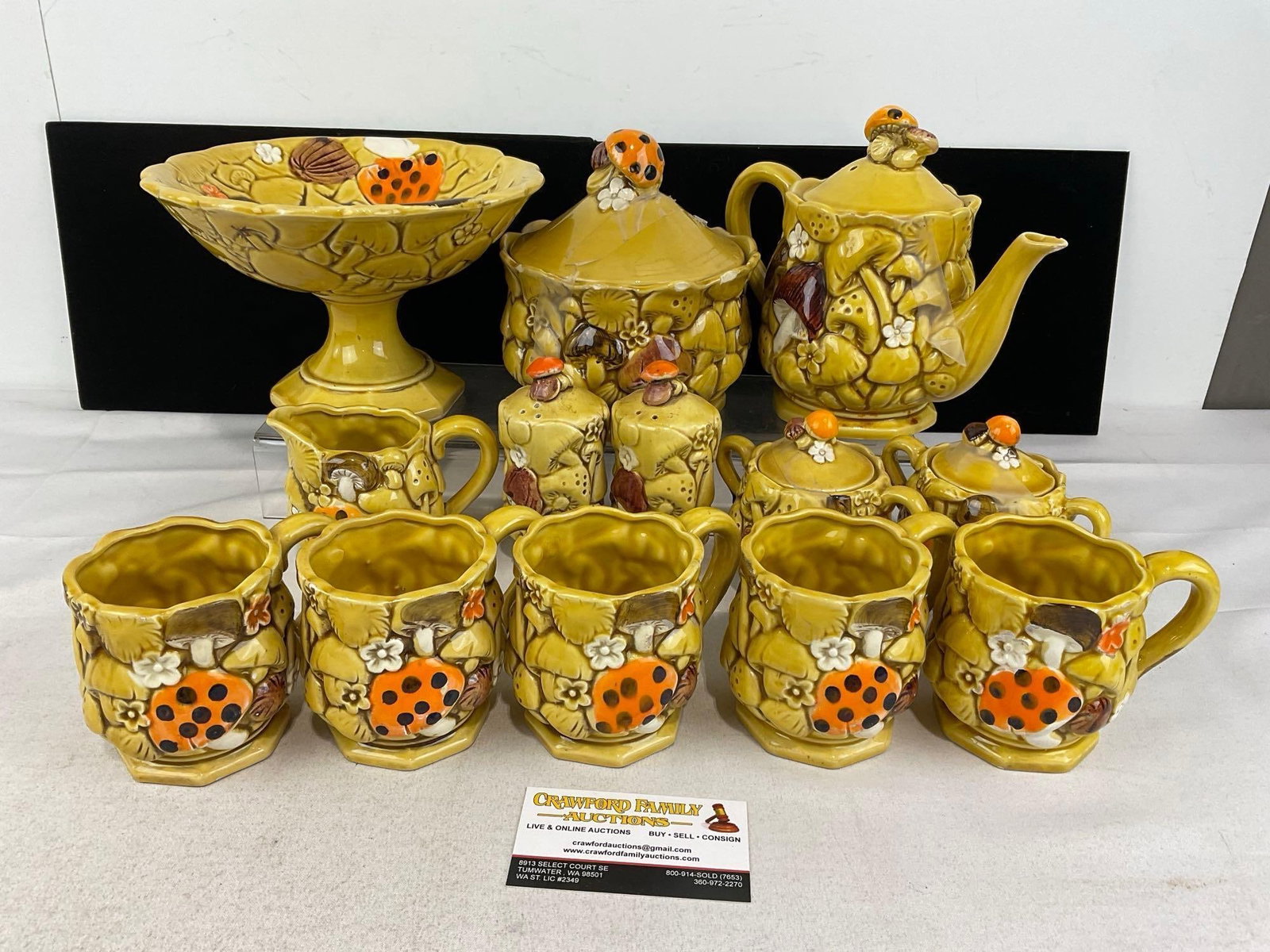 13 pc 1950s Mushroom Ceramic Teaset, Footed Compote, Teapot, 5 cups, S&P Shakers, Cream & Sugars: Appears to be in good shape. The piece measures approx 10h x 19w x 15d inches. See pics. E-6070