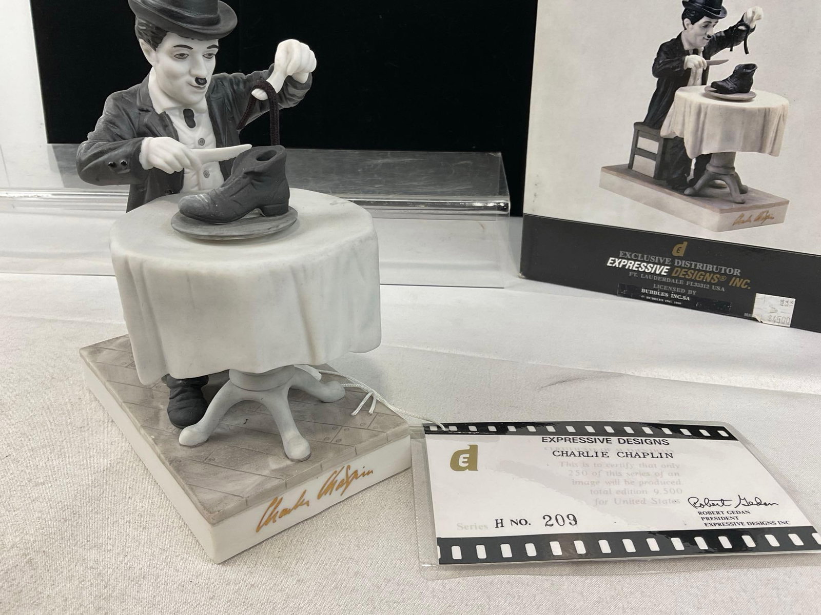 Alaska Marine Ferry, Hubley Folding Plane, 1985 Ford 9N Tractor, Charlie Chaplin Porcelain Statue - 10
