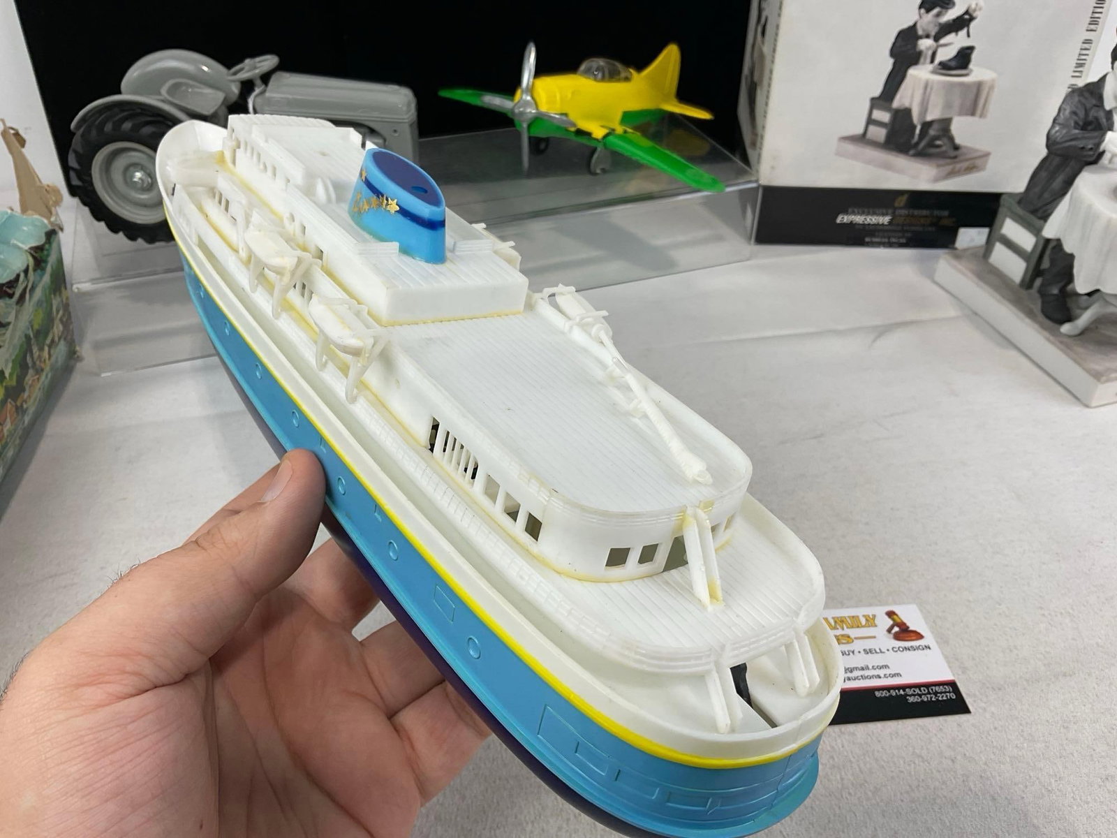 Alaska Marine Ferry, Hubley Folding Plane, 1985 Ford 9N Tractor, Charlie Chaplin Porcelain Statue - 4