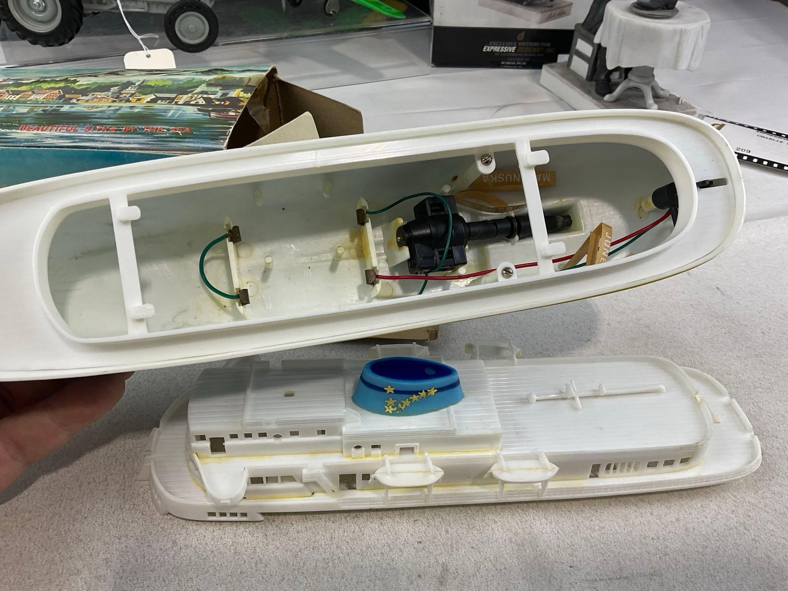 Alaska Marine Ferry, Hubley Folding Plane, 1985 Ford 9N Tractor, Charlie Chaplin Porcelain Statue - 5