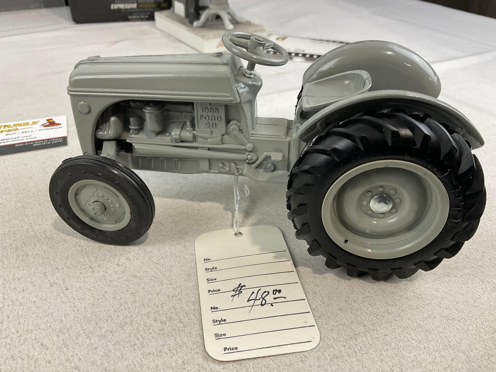 Alaska Marine Ferry, Hubley Folding Plane, 1985 Ford 9N Tractor, Charlie Chaplin Porcelain Statue - 9