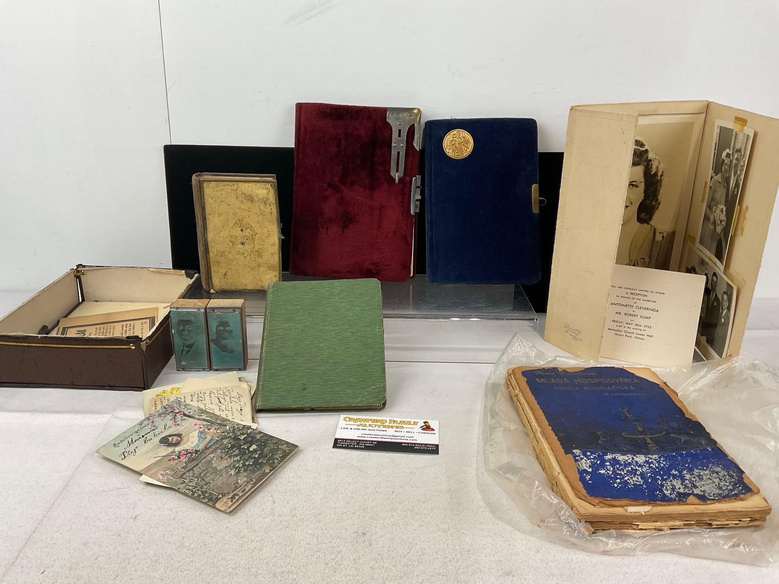 Vintage Marriage Photos, Antique Notebooks, Polish Cookbook, & pair of tin Stamps of a Couple: Appears to be in fair to good shape, some shows wear from over the years. The piece measures approx 5h x 11w x 8d inches. See pics. E-5950