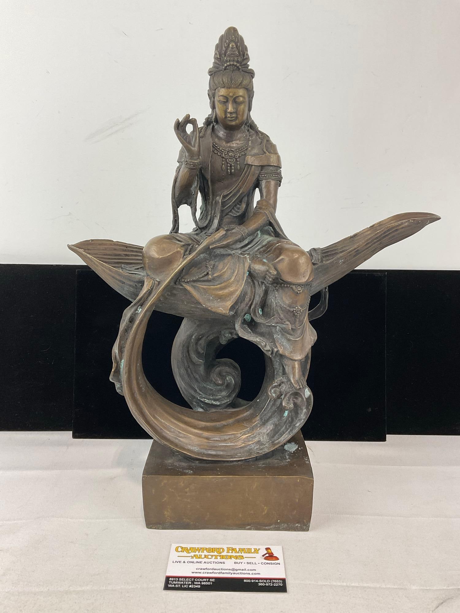 Cast Bronze Sculpture Bodhisattva Guanyin figure on Leaf, 17h x 13w x 7d inches: Appears to be in good shape. The piece measures approx 17h x 13w x 7d inches. See pics. E-6080