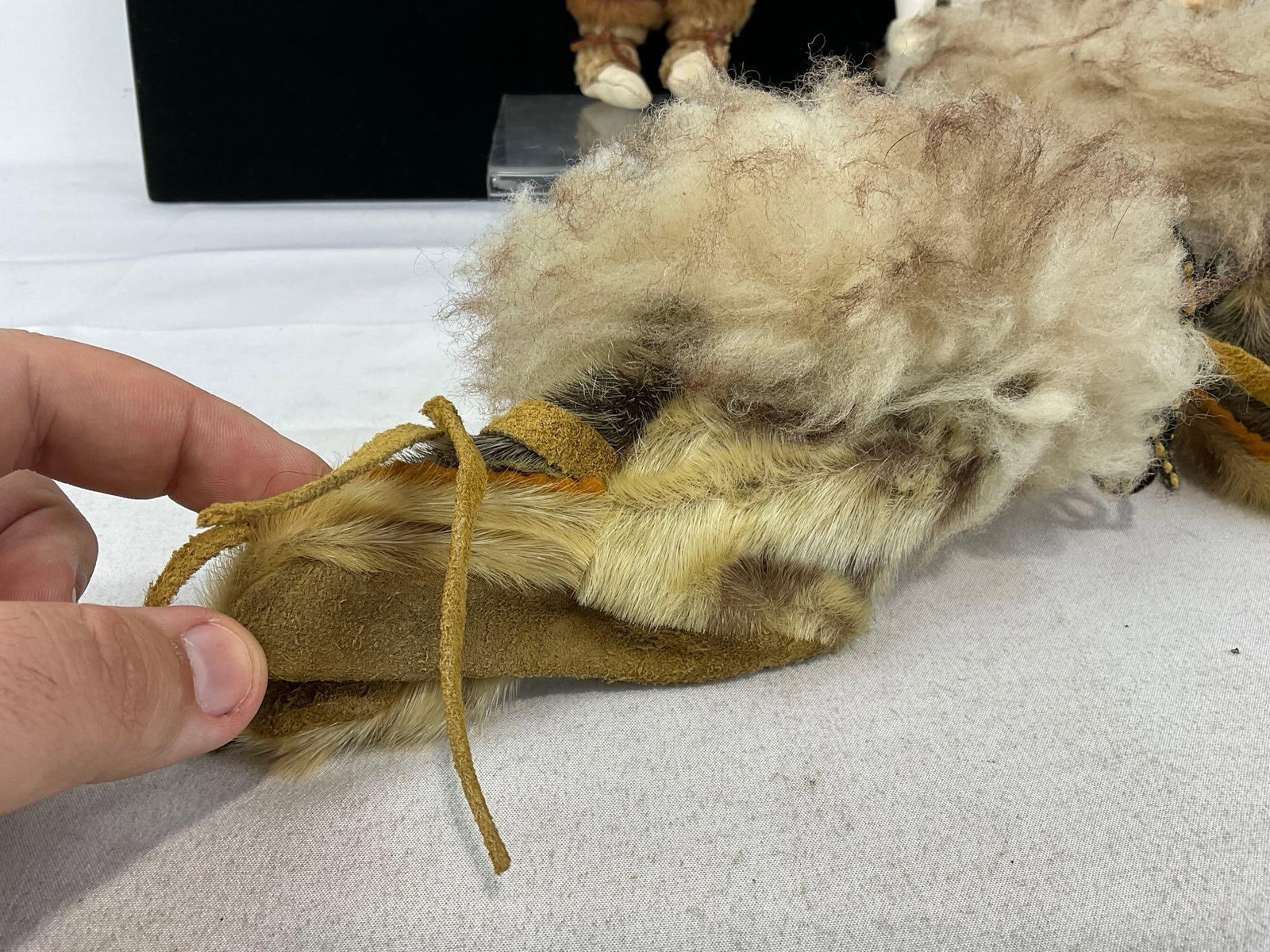 3 Native American Fur & Leather Dolls, Rabbit Fur Bag, & Pair of Moccasins, Rock Statue - 4