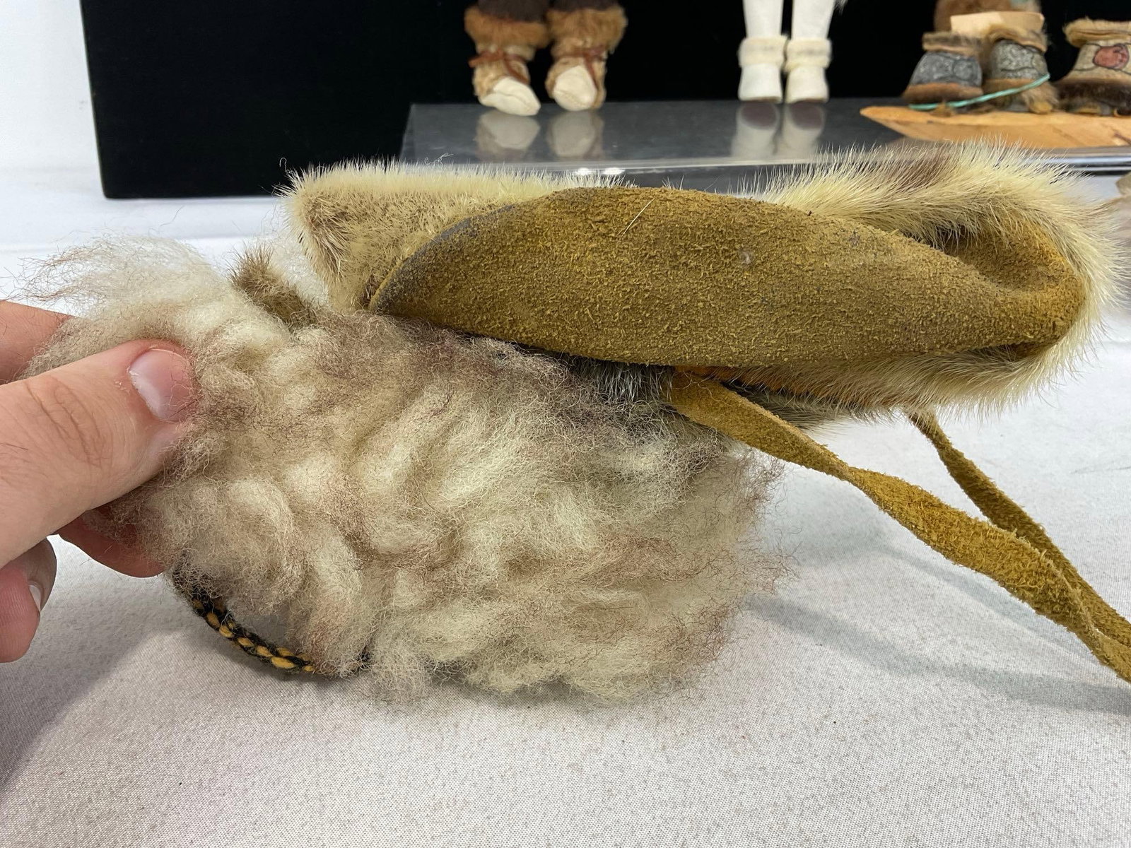 3 Native American Fur & Leather Dolls, Rabbit Fur Bag, & Pair of Moccasins, Rock Statue - 5