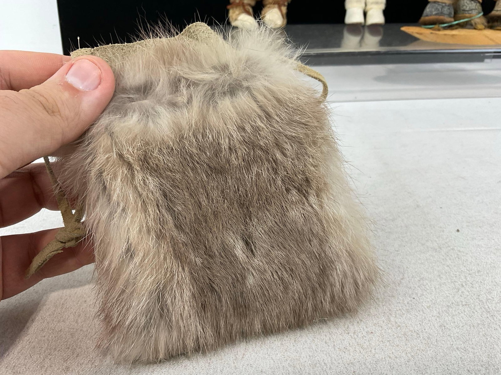 3 Native American Fur & Leather Dolls, Rabbit Fur Bag, & Pair of Moccasins, Rock Statue - 6