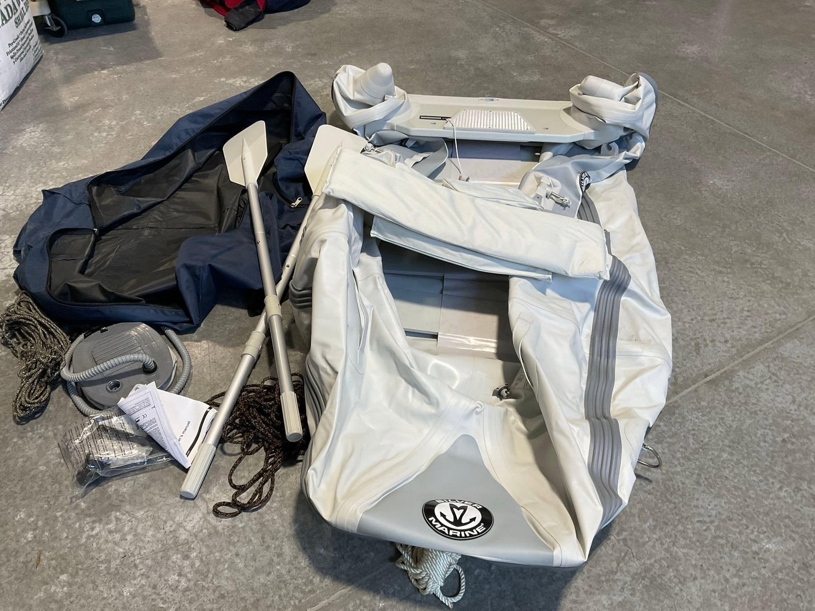 Silver Marine Nemo 250 SD Inflatable Boat, 8 feet 2 inch when inflated, in carrying case: *No in-house shipping due to size* Appears to be in good shape, untested, assumed working, comes with a foot pump. The pieces fit in the bag that measures 18h x 50w x 26d inches. See pics.