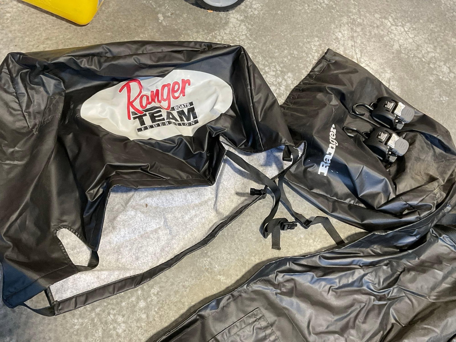 Massive Ranger Boat Cover model Z21 in black, roughly 18 x 8 feet coverage, in carrying bag: Similar to the next lot, same model Z21. Appears to be in good shape. The pieces fit in the bag that measures 20h x 25w x 25d inches. See pics. E-5600