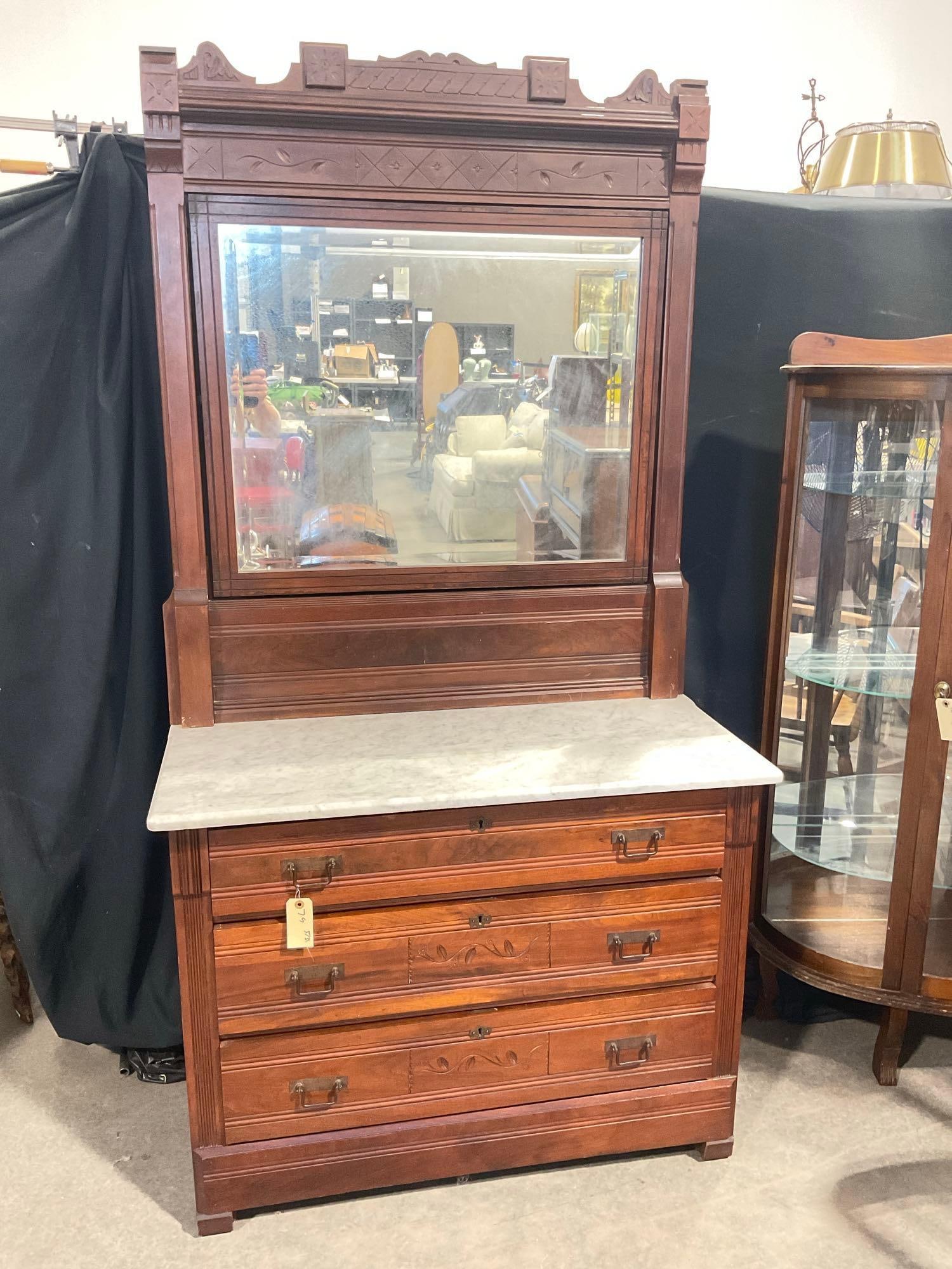 Antique Eastlake 1890's mahogany marble top 3 drawer vanity dresser w/ mirror and carved design: In good cond for age some minor wear indicative of age, see pics. Otherwise good cond. the mirror is slightly foggy as usual for this era. Eastlake carving is towards the end of that period in