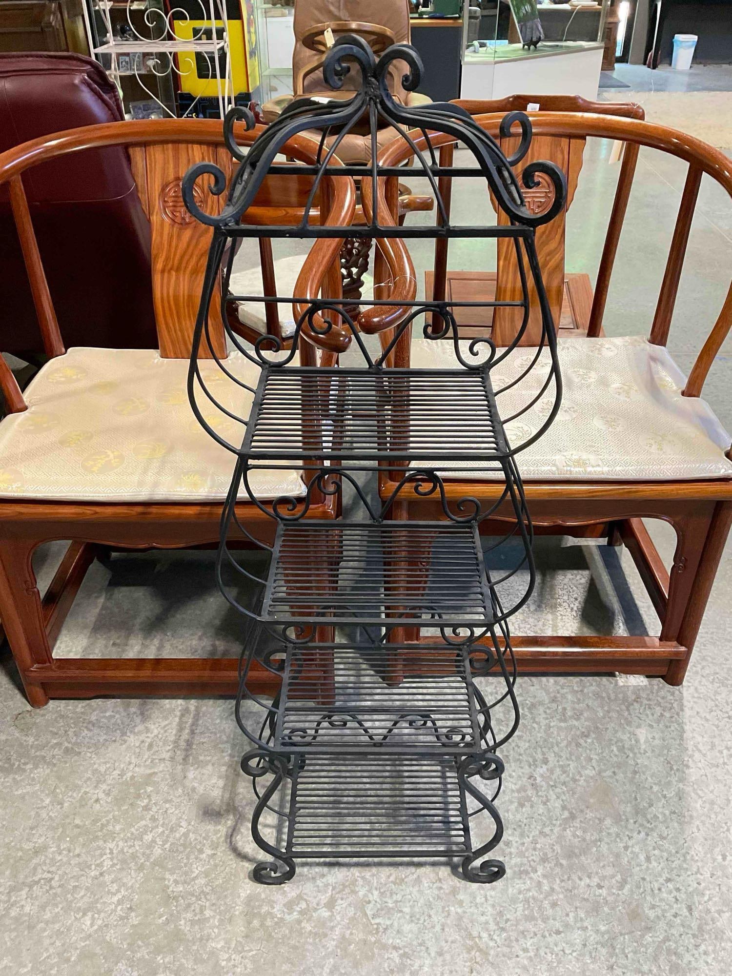 Black Wrought Metal 4-Tier Plant Stand w/ Decorative Tower Shape. Good Condition. See pics: Black Wrought Metal 4-Tier Plant Stand w/ Decorative Tower Shape. Good Condition. Minor wear indicative of age and use, otherwise looks to be in good condition. Measures 15" x 9" x 45"