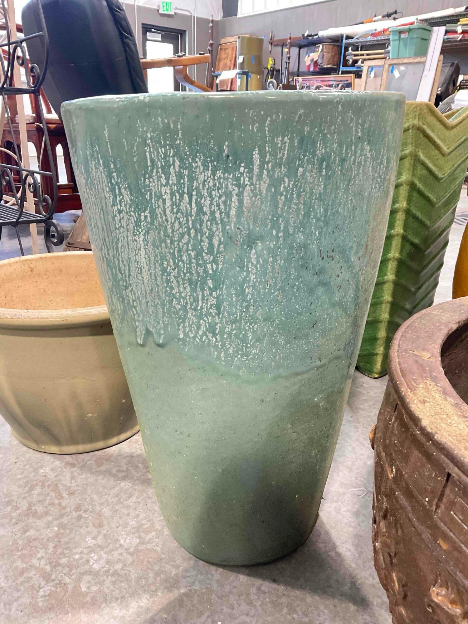 Teal Glazed Ceramic Planter Pot. Measures 13" x 13" x 20" Good Condition.: Teal Glazed Ceramic Planter Pot. Measures 13" x 13" x 20" Good Condition. Minor wear indicative of age and use, otherwise looks to be in good condition. DM-6130 *Freight Required if shipped,