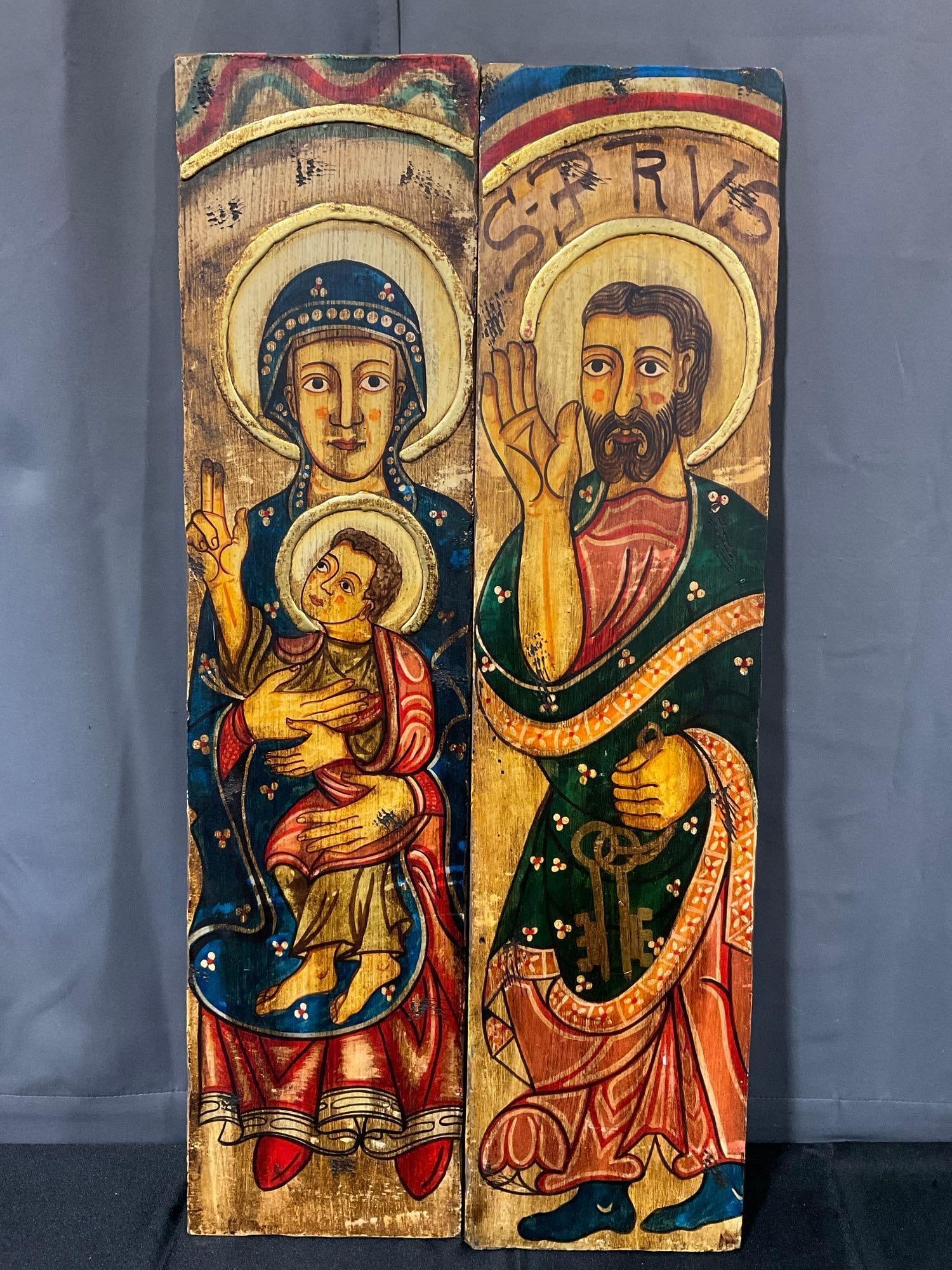 Pair of Wooden Religious Icons, Handpainted in bold colors, 1 Joseph & 1 Mary & Baby Jesus, 36x9x2: Appears to be in fair to good shape. The piece measures approx 36h x 9w x 2d inches. See pics. E-6080