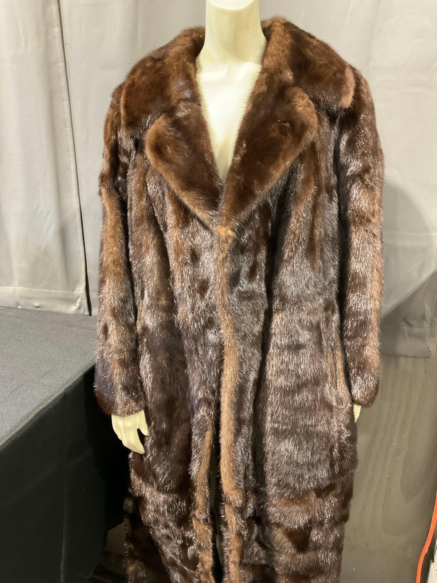 Vintage Dark Brown German Lady Style Mink Fur Coat, 49 inches long, 18 inches wide: Appears to be in good shape. Piece has no sizes inside, the piece measures approx 49 inches long, and 18 inches from shoulder to shoulder. See pics. E-6090