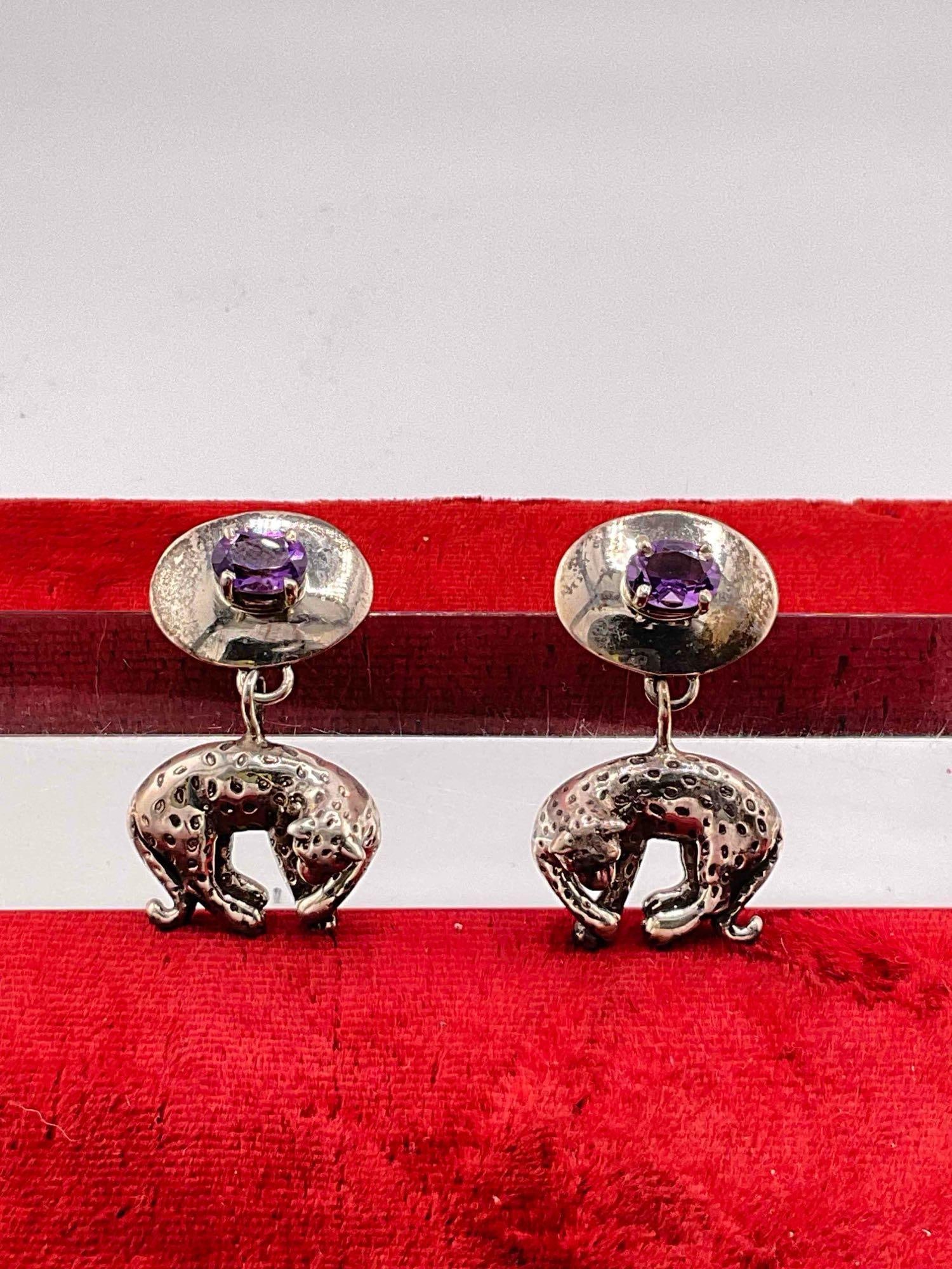 Vintage Carol Felley Sterling Silver Drop Earrings w/ Leopard Design & Amethyst Toned Setting.: Vintage Carol Felley Sterling Silver Drop Earrings w/ Leopard Design & Amethyst Toned Setting. Stamped 90 on reverse. DM-414